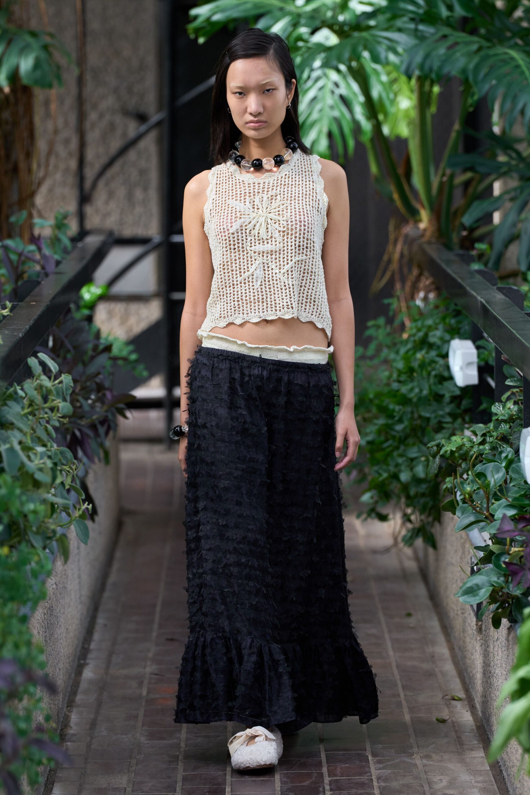 beige crochet top black tiered skirt