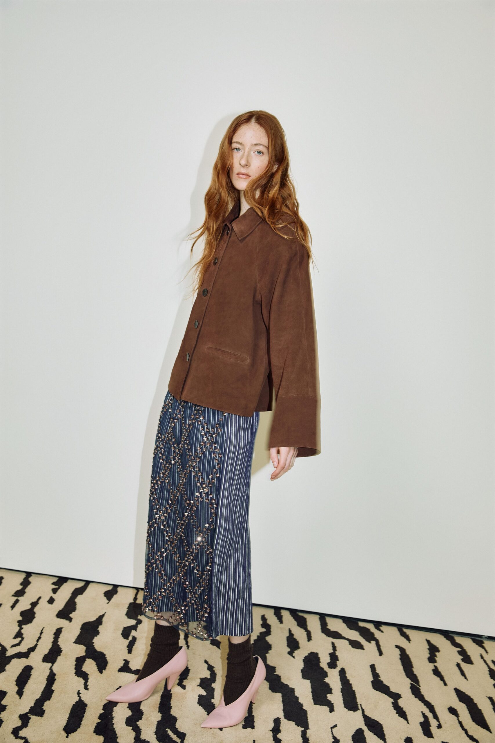 brown suede jacket with midi skirt