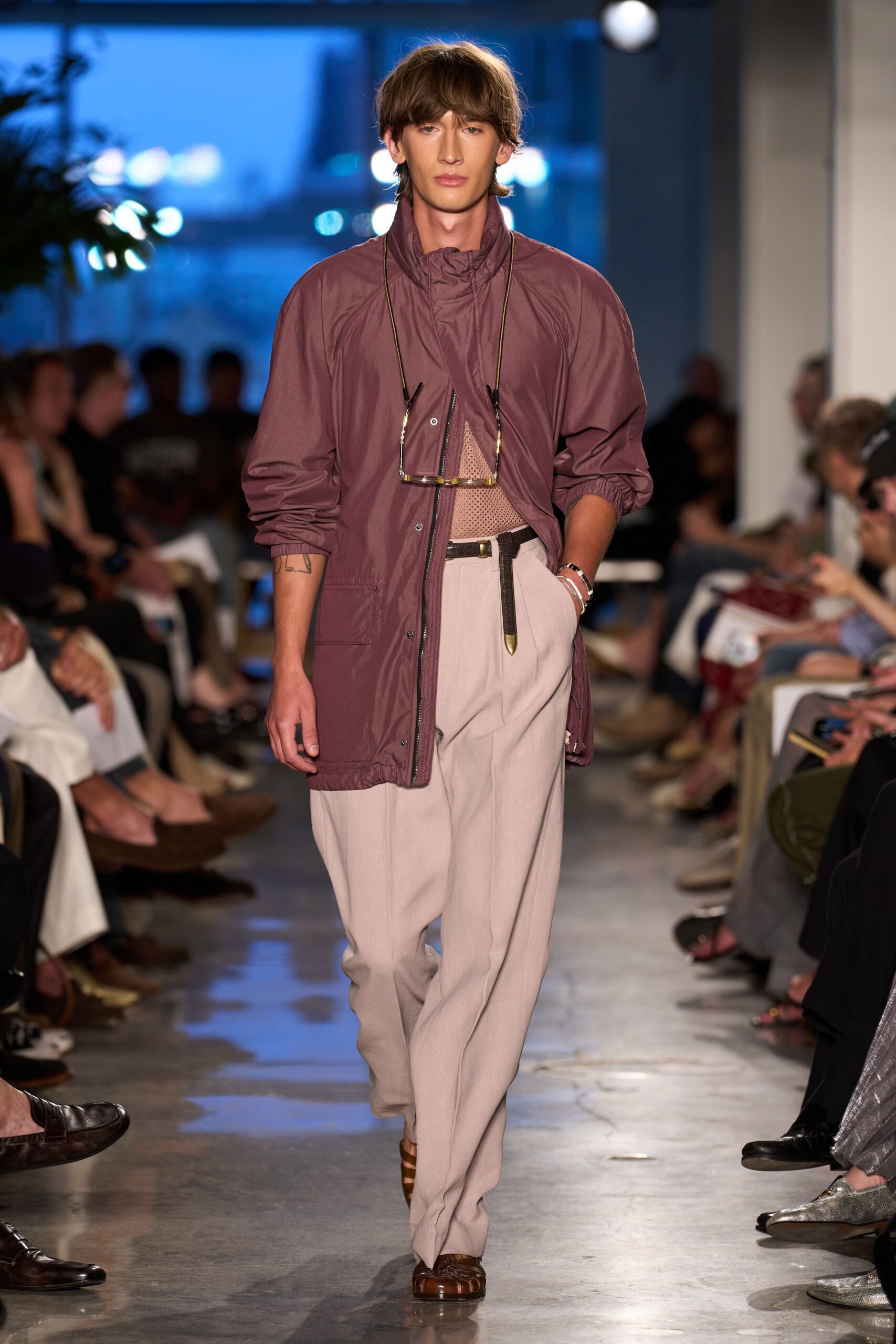 purple relaxed jacket with beige tailored pants