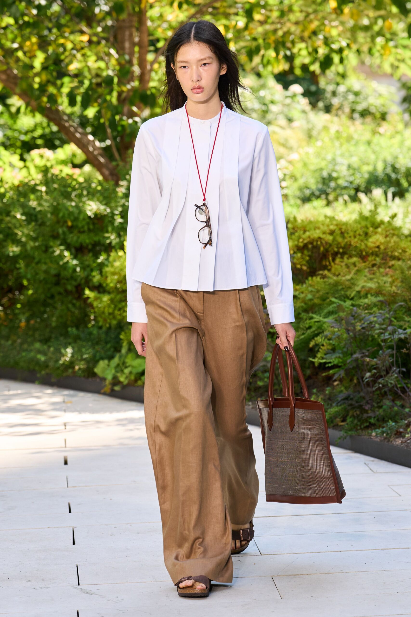 white relaxed shirt with brown pants