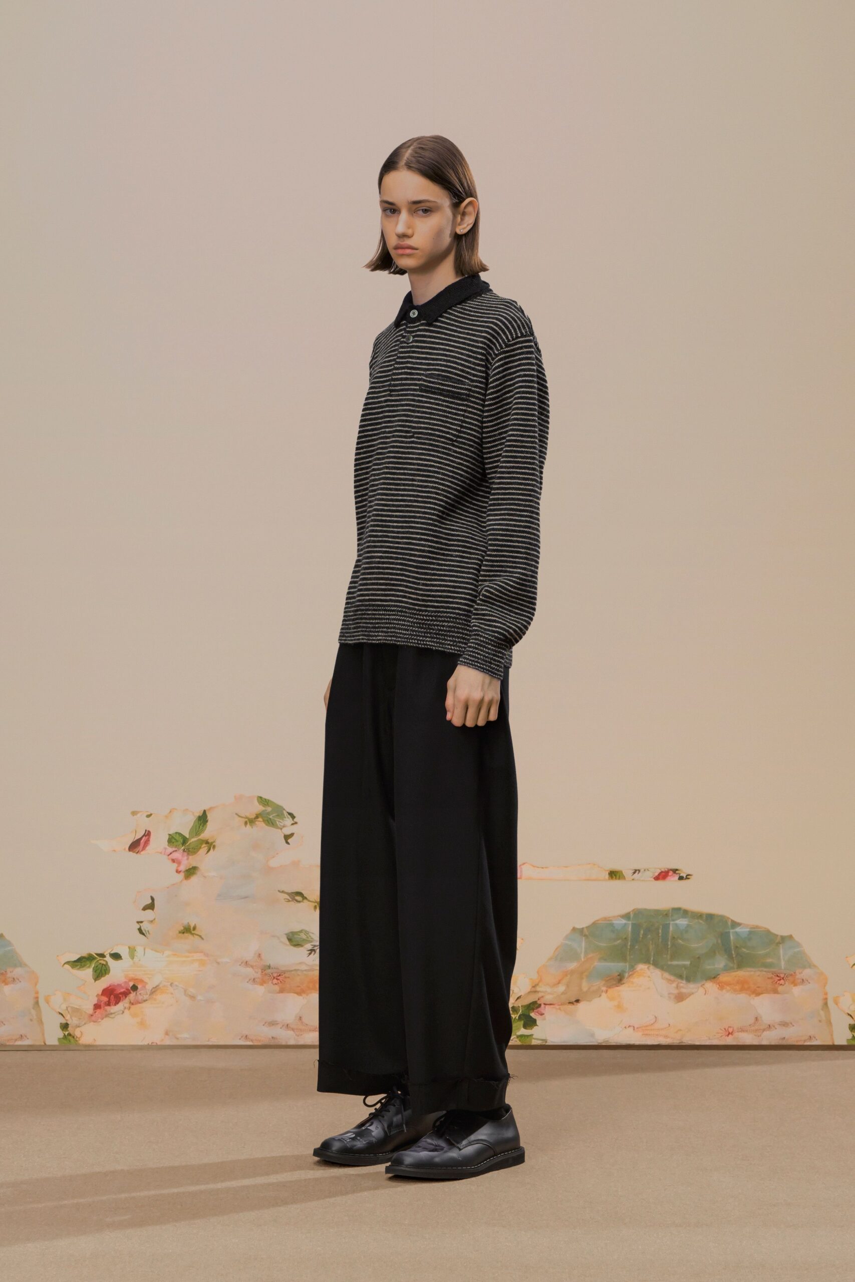 black and white striped top with wide-leg pants