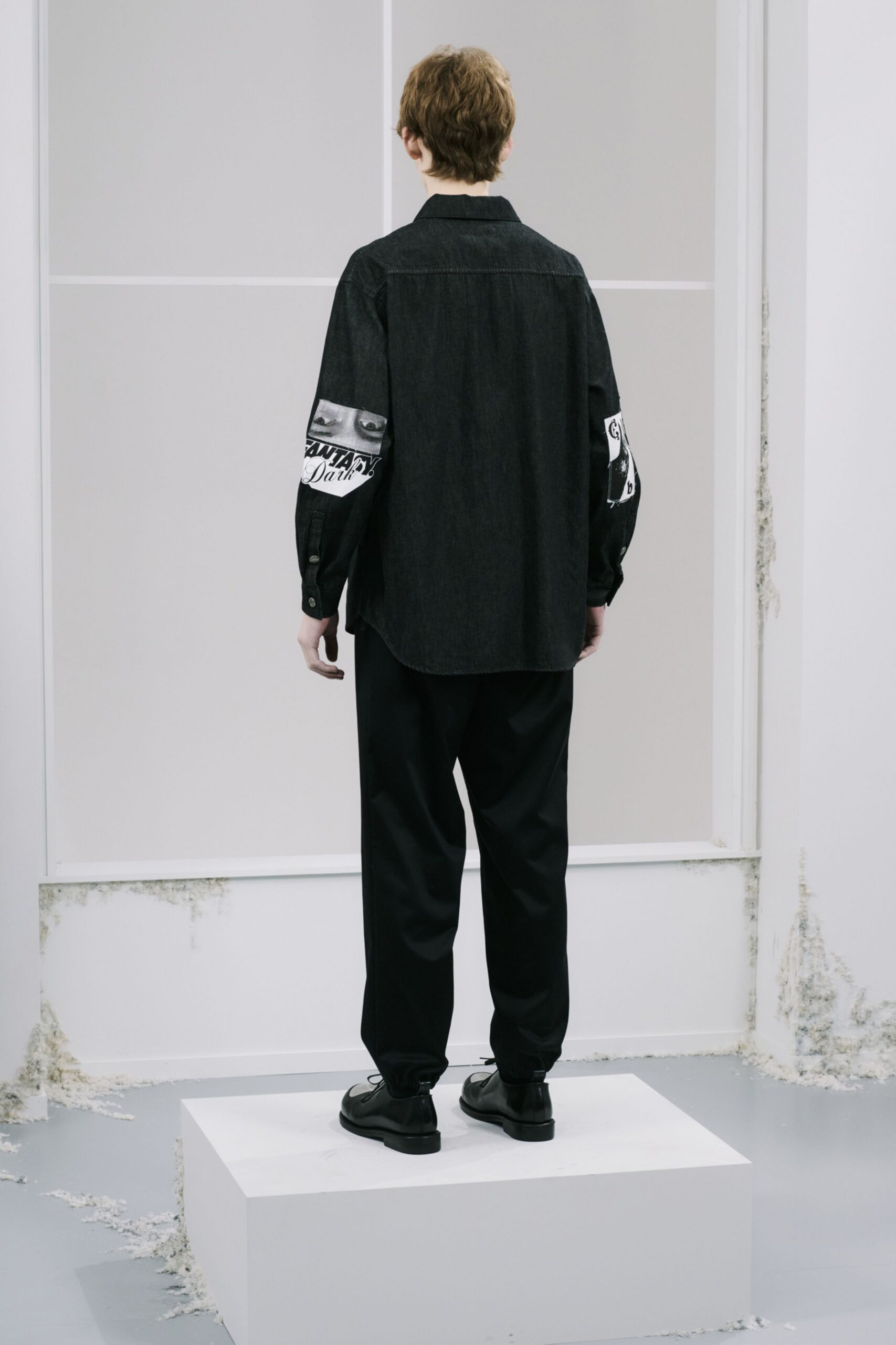 black denim shirt with relaxed pants