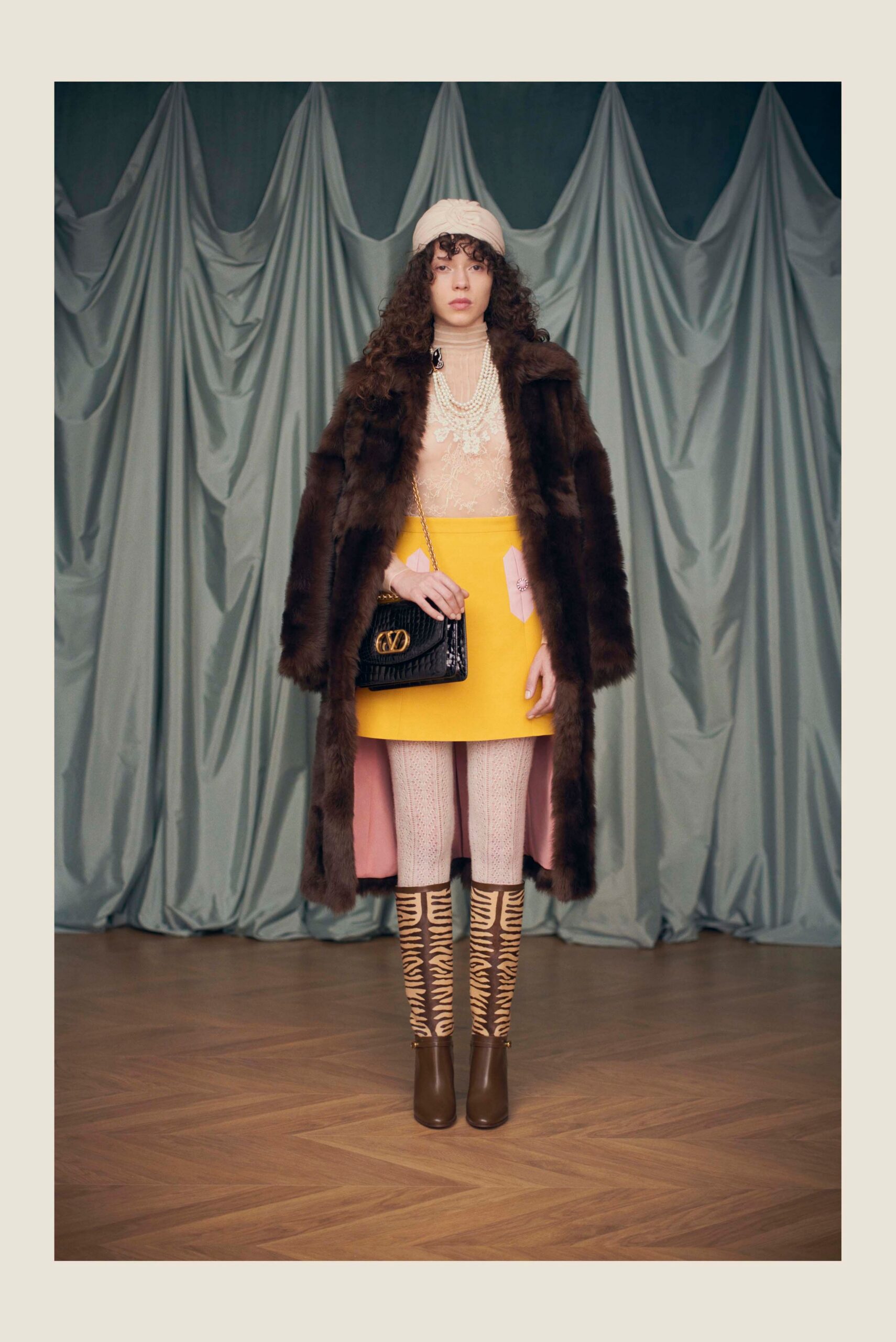 brown fur coat with yellow skirt