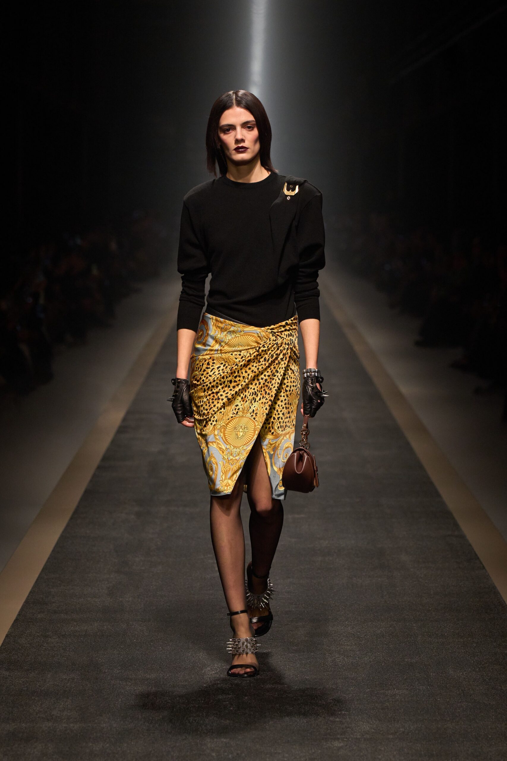 black fitted top with yellow printed skirt