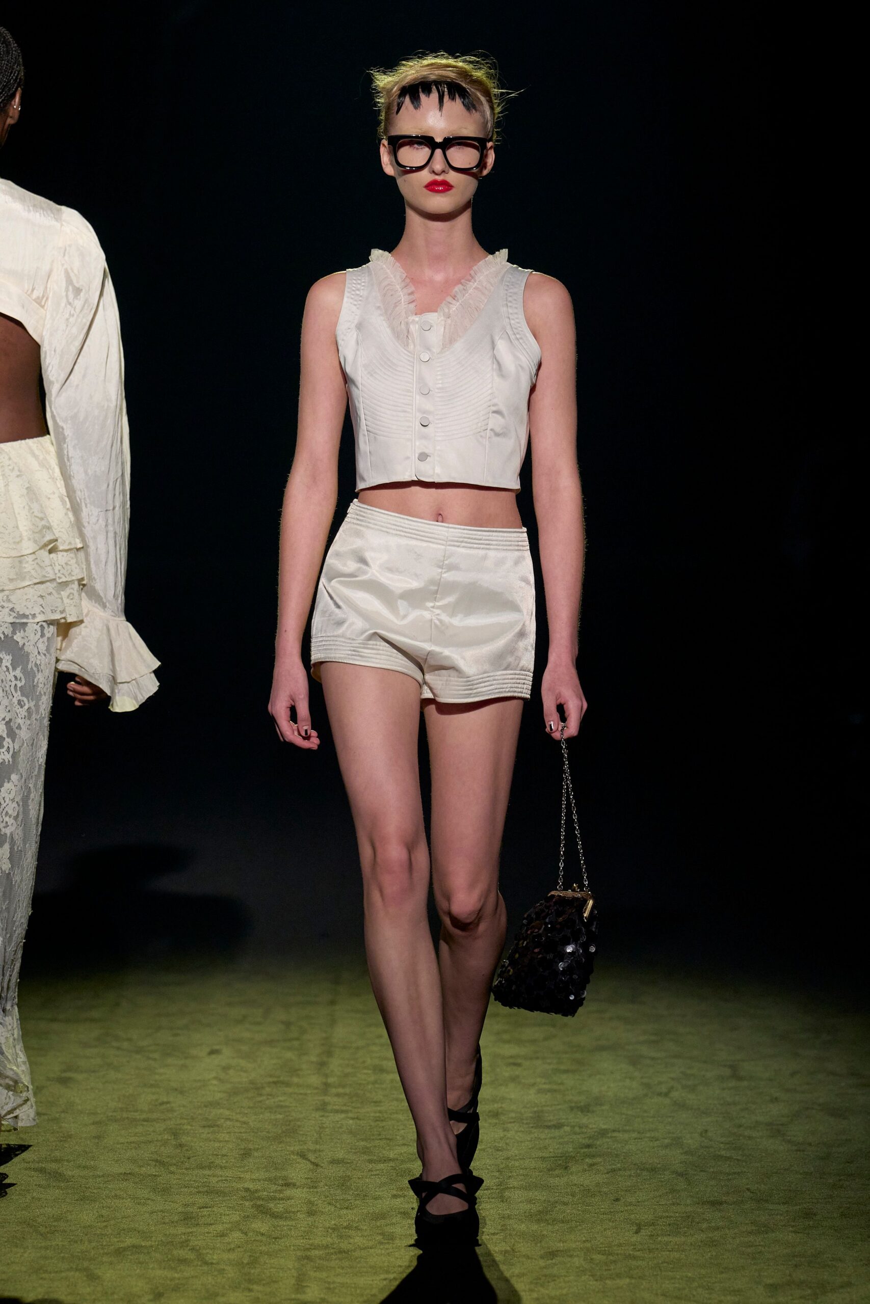 white cotton sleeveless collared fitted ruffled cropped top