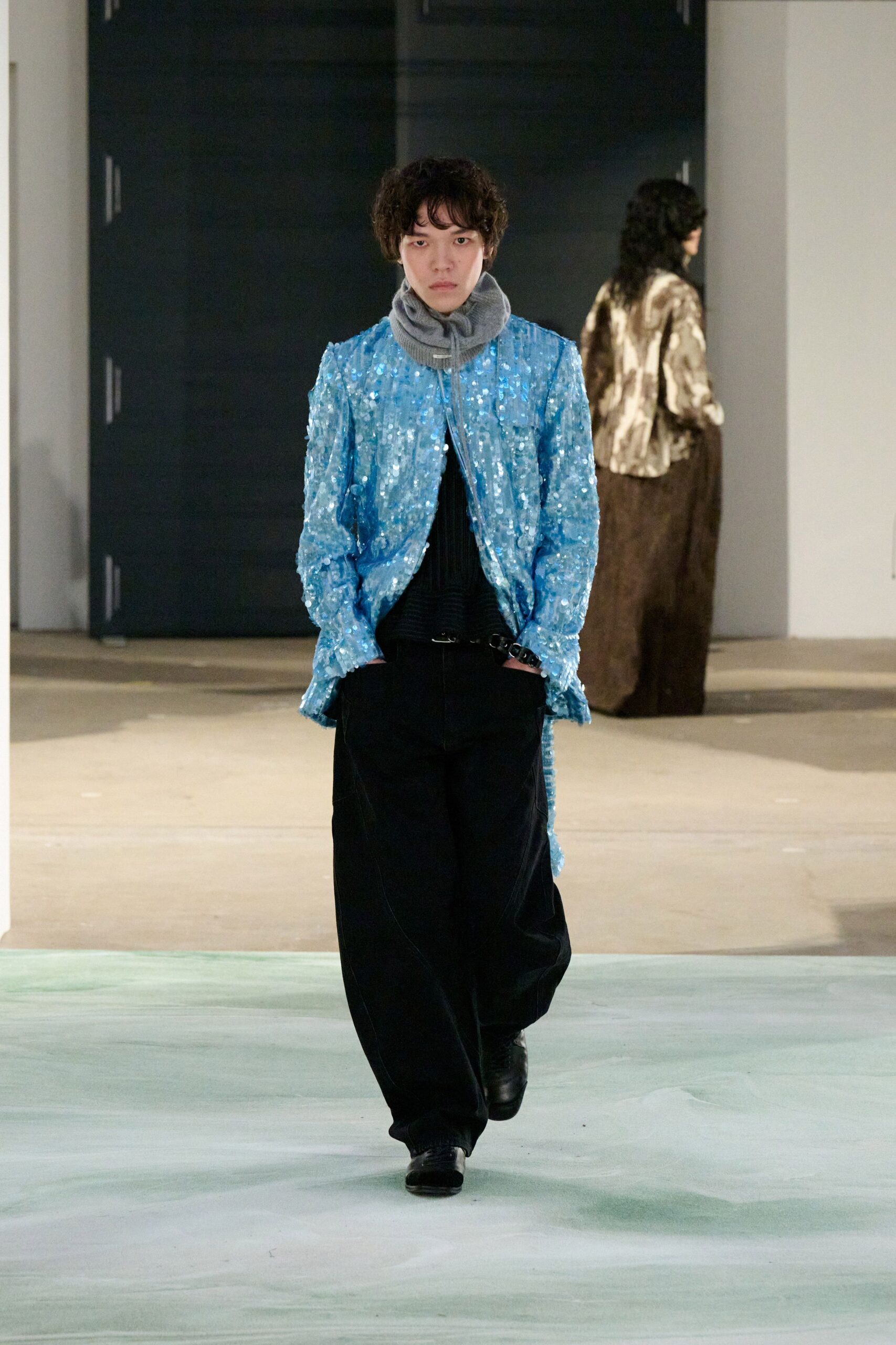 blue sequin coat with black outfit
