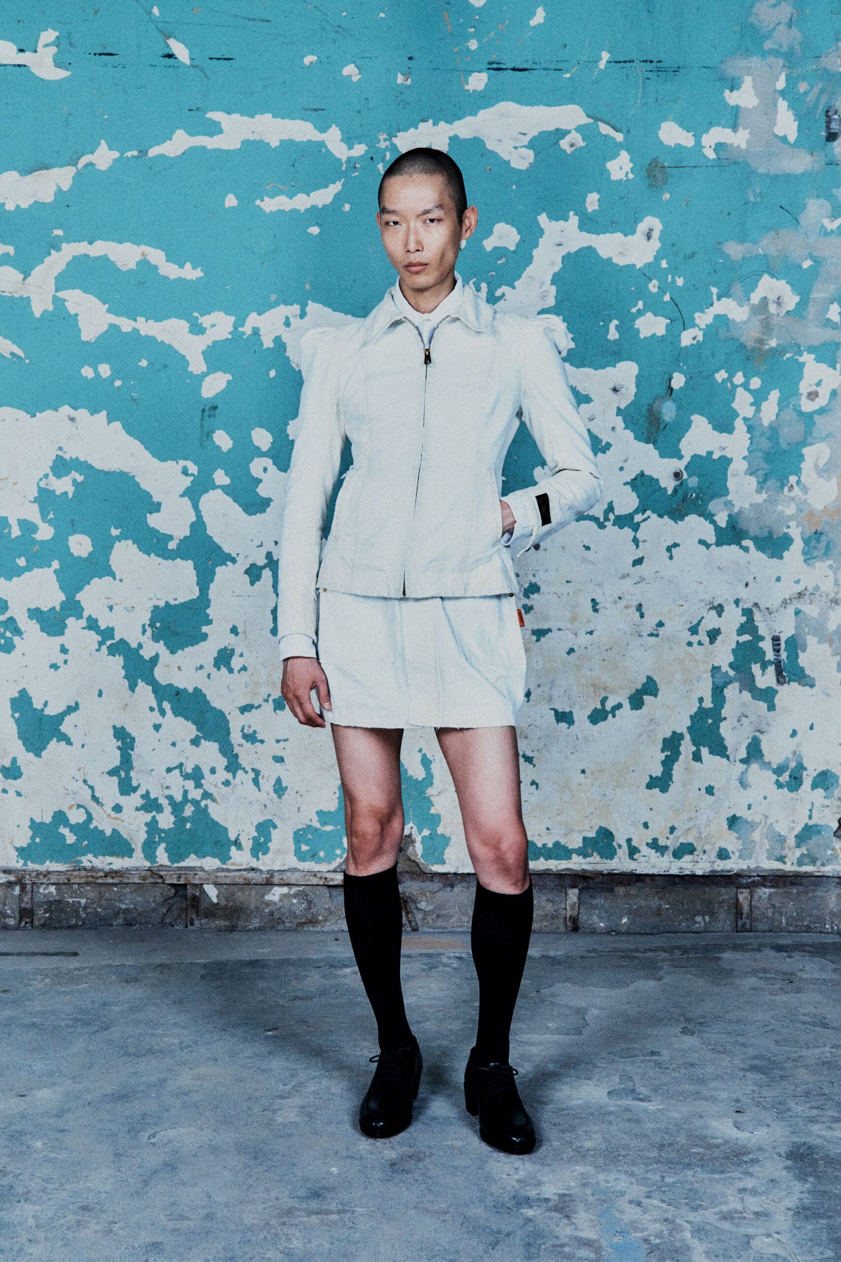 white leather long-sleeve collared fitted zippered jacket