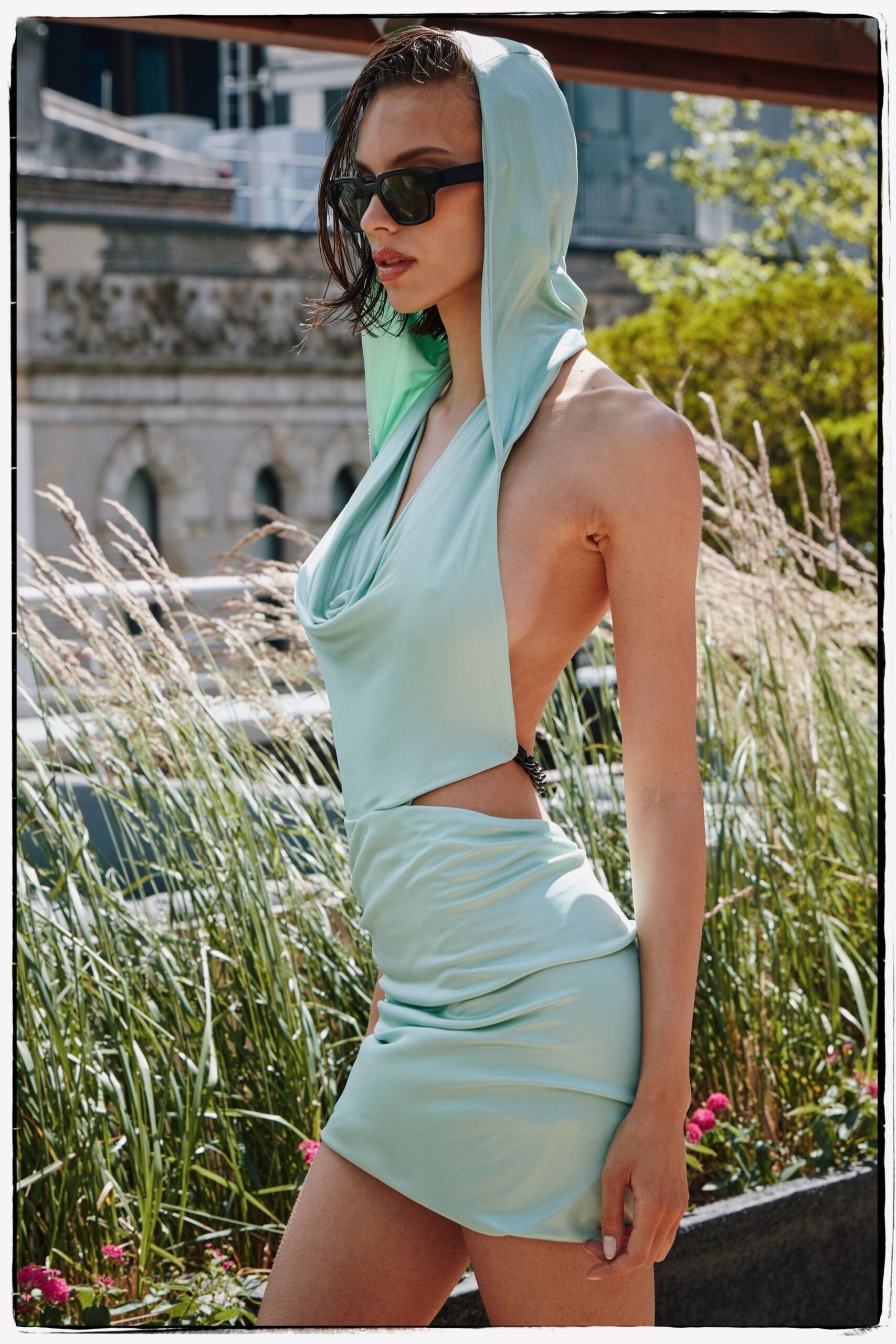 green silk sleeveless halter fitted draped mini dress