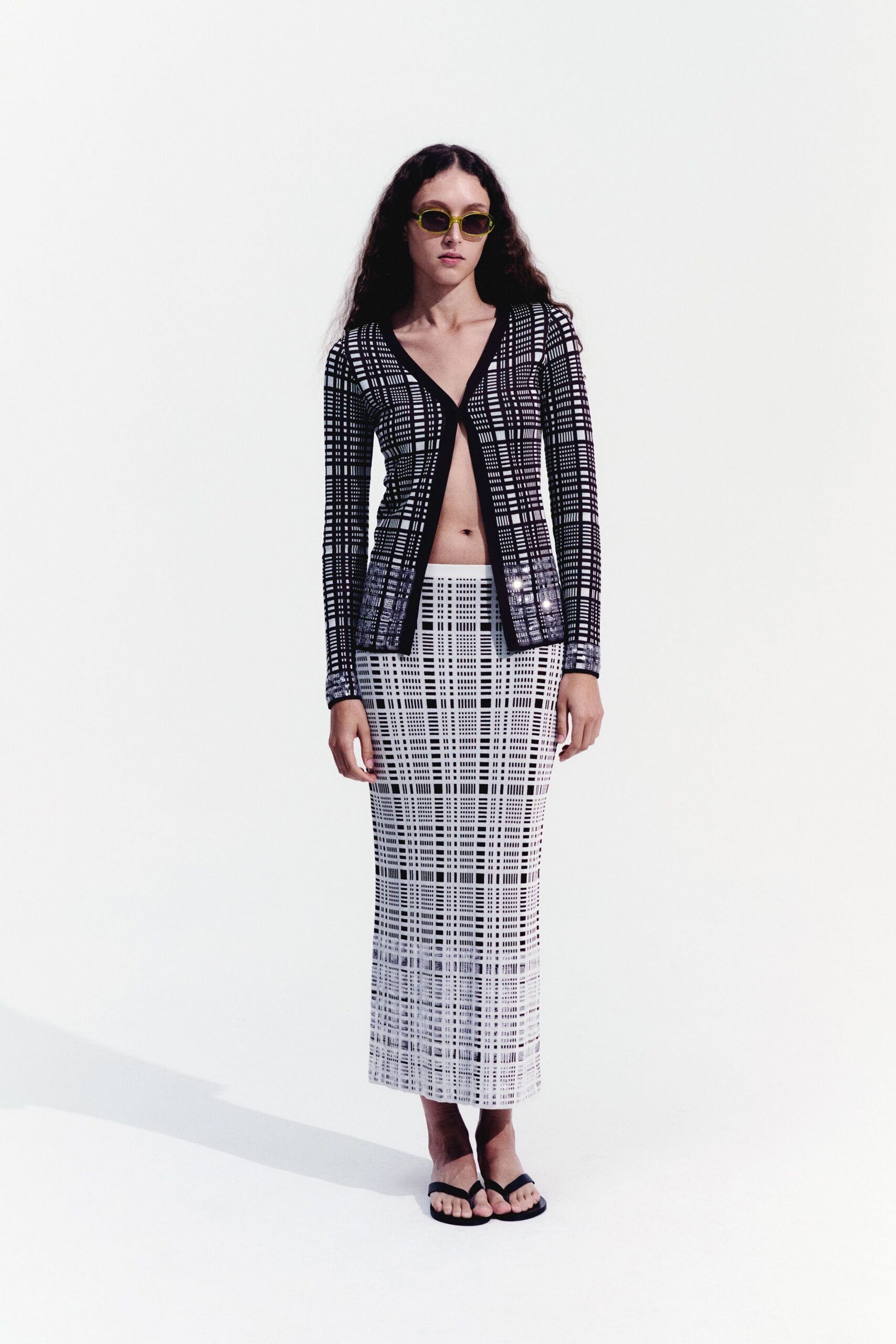 black and white checked blazer and skirt