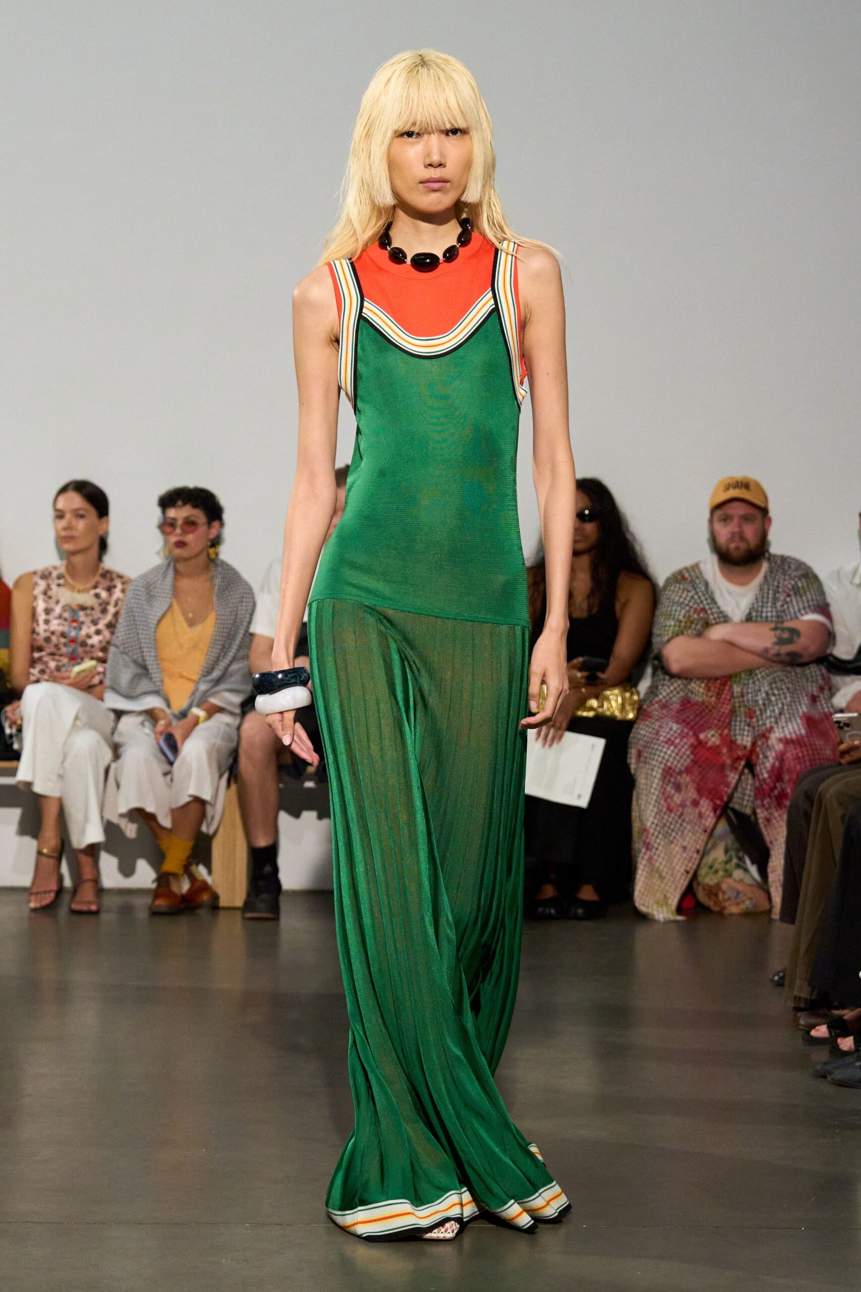 green silk sleeveless v-neck fitted layered pleated dress