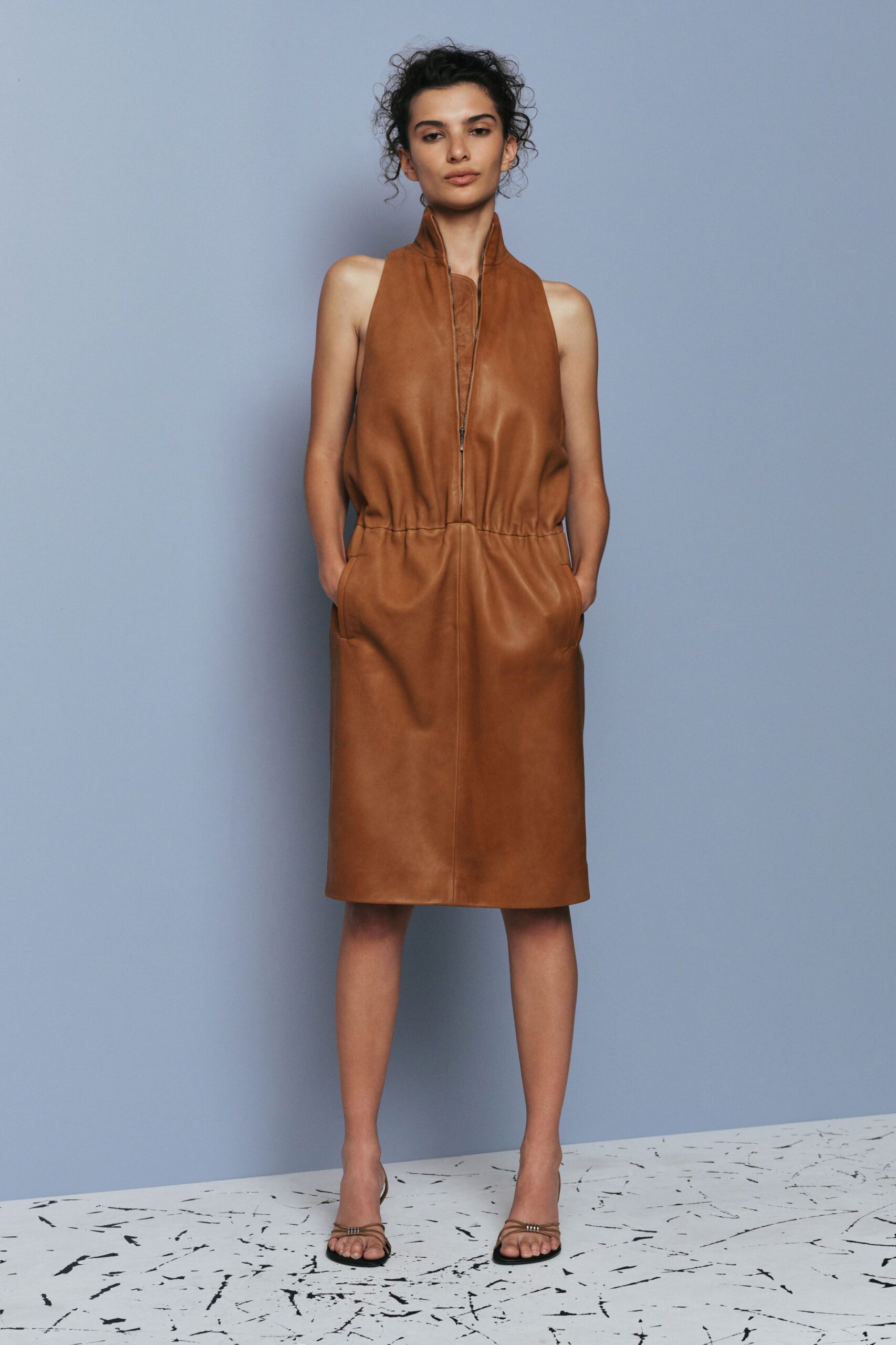 brown leather sleeveless high-neck fitted zippered pockets dress