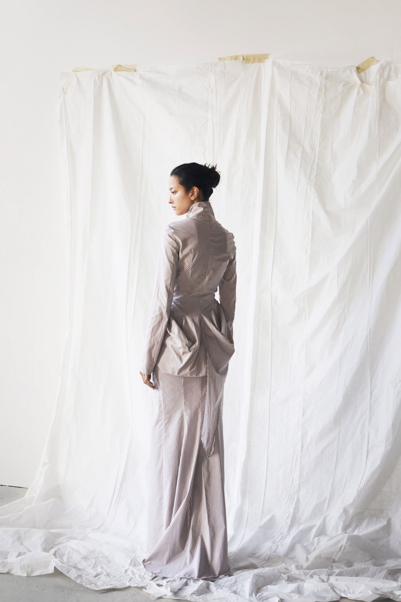 beige fitted long-sleeve gown