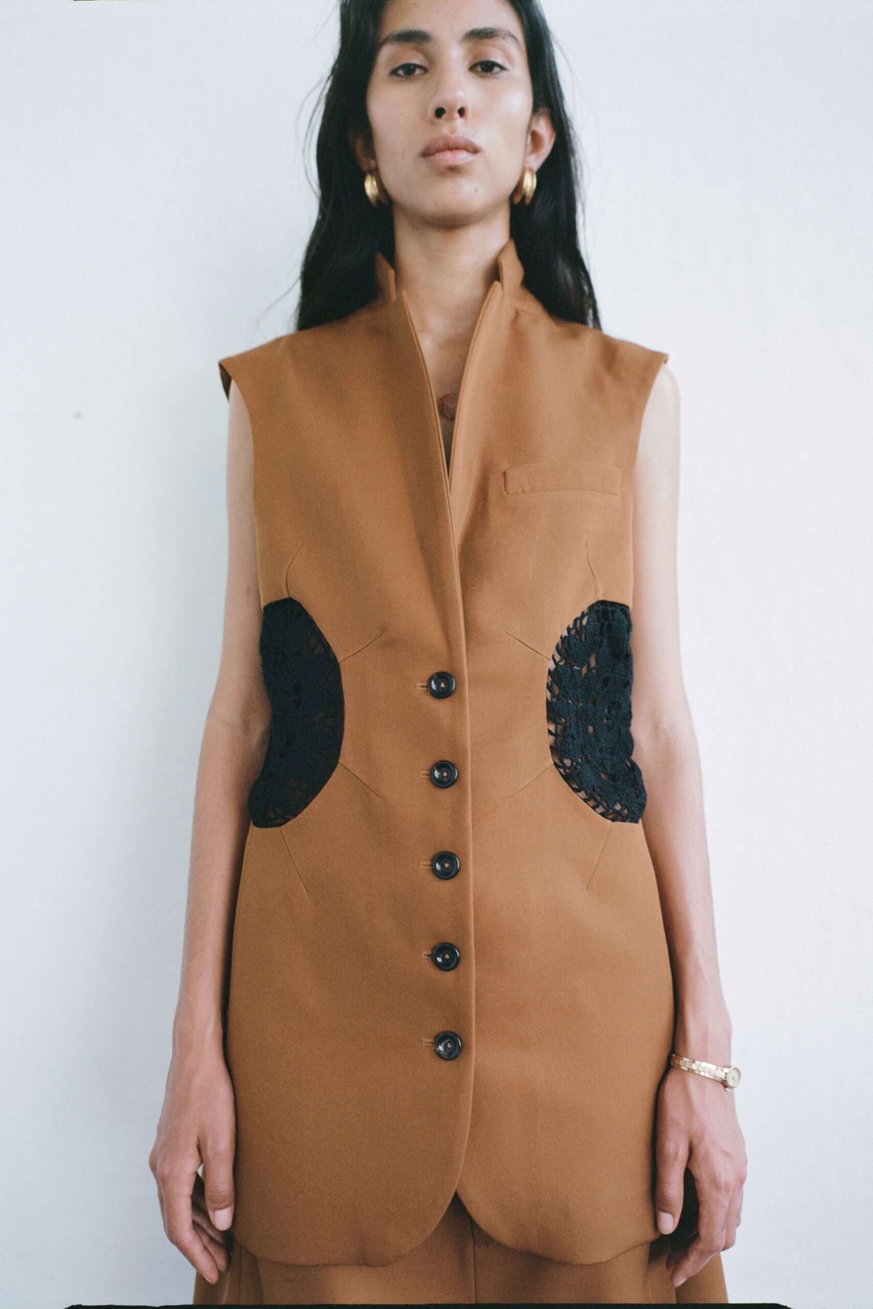 brown fitted sleeveless vest