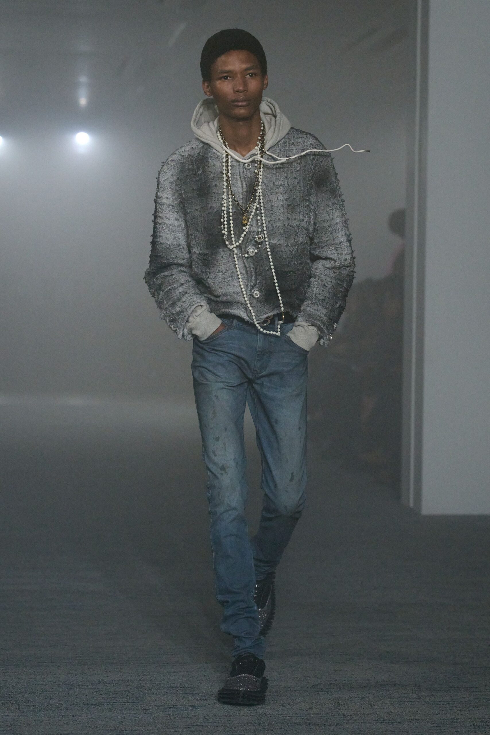 gray hooded jacket with denim pants