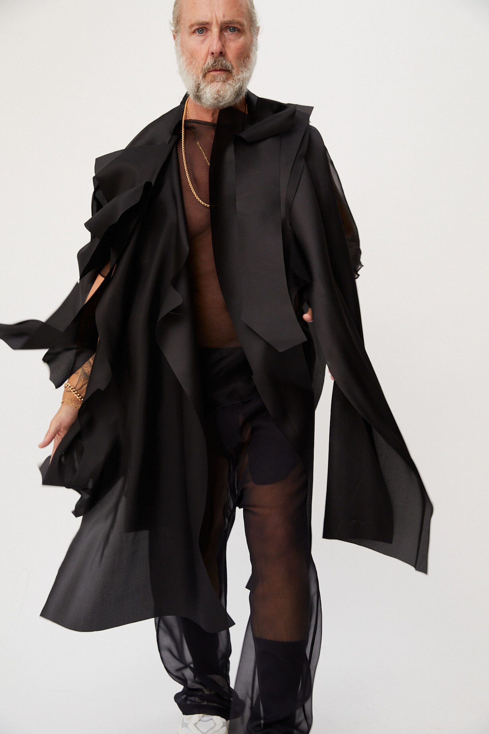 black silk long-sleeve relaxed ruffled flowing coat
