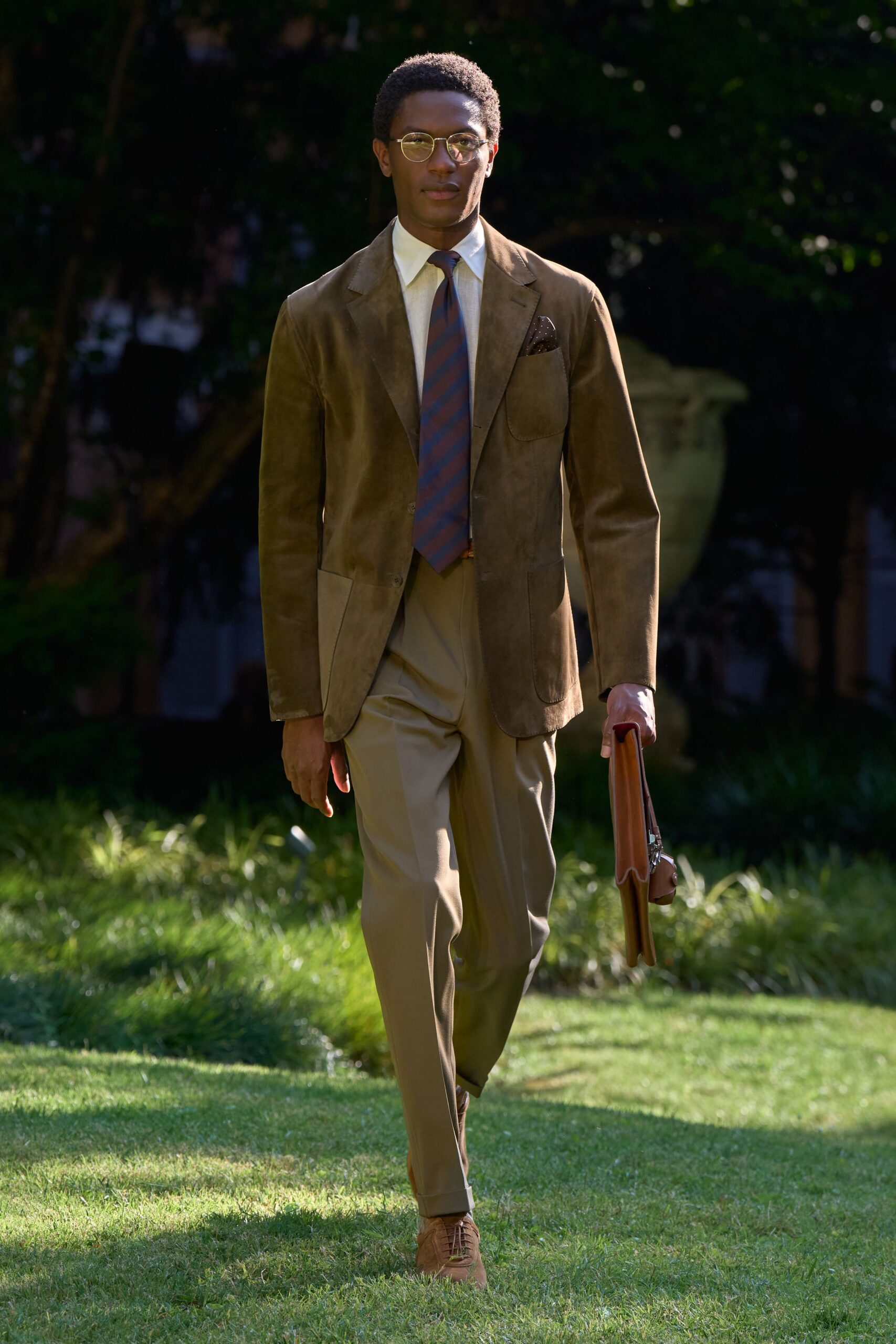 brown suede blazer with beige pants