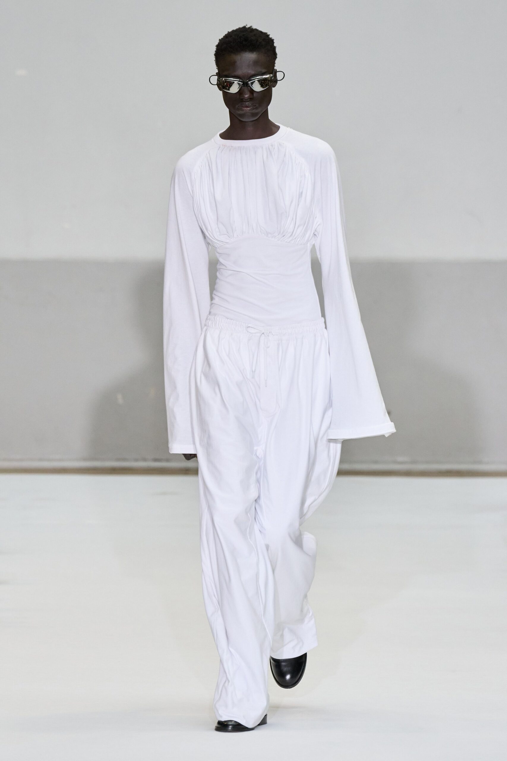 white fitted top and relaxed pants