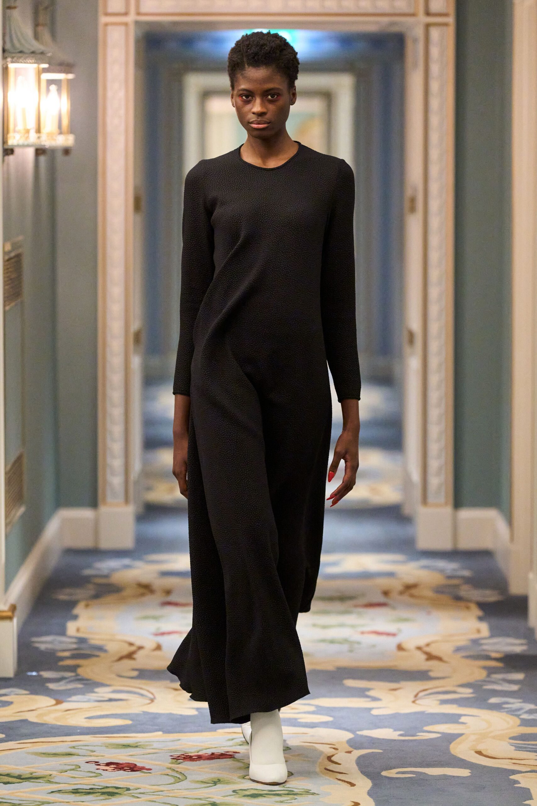 black knit long-sleeve high-neck relaxed wide-leg jumpsuit
