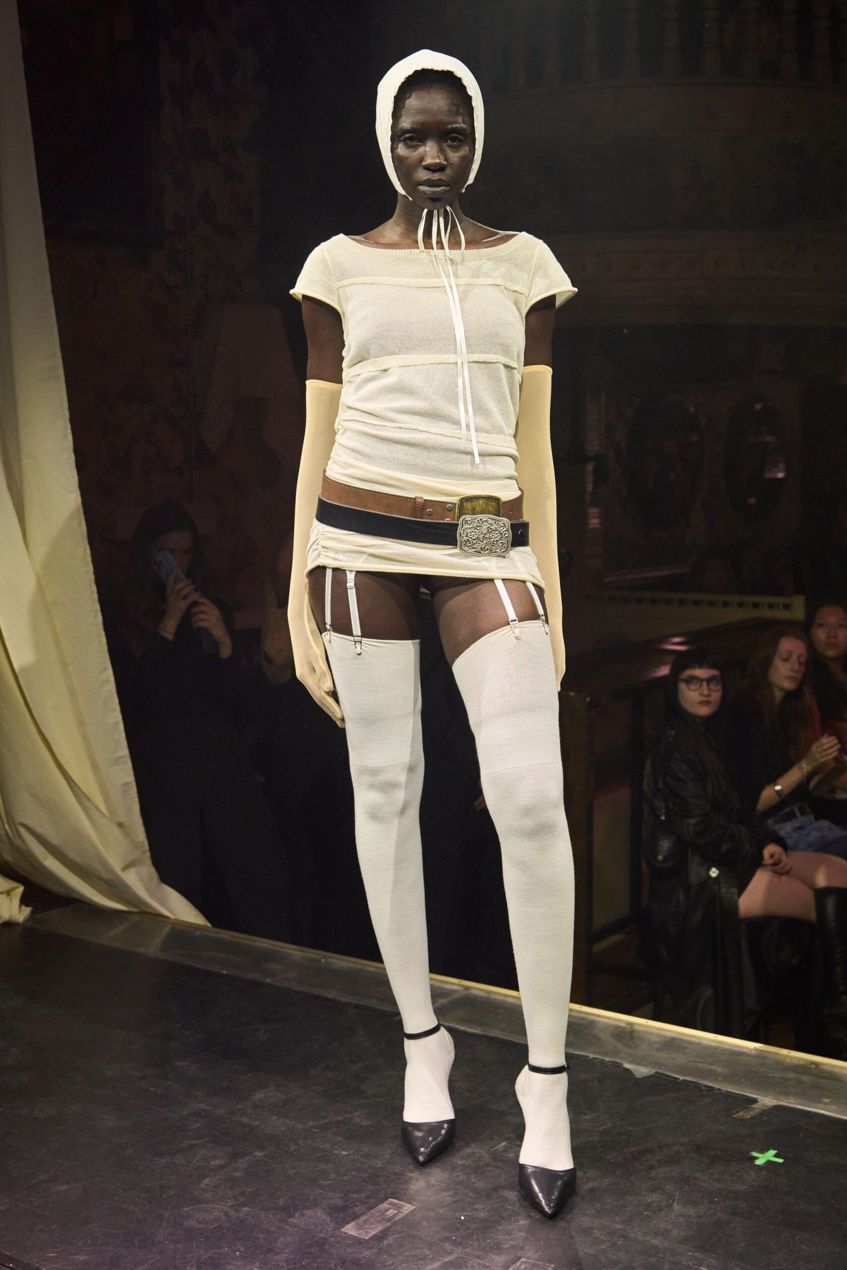 fitted white top and mini skirt
