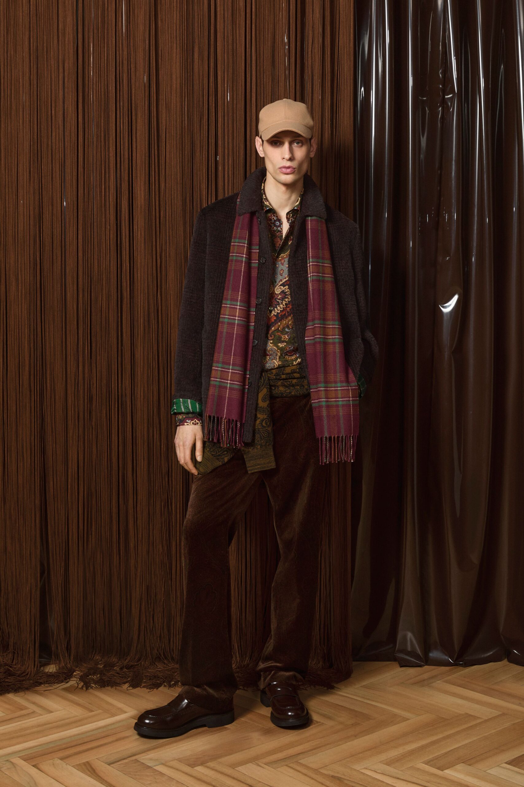 black wool coat with plaid scarf
