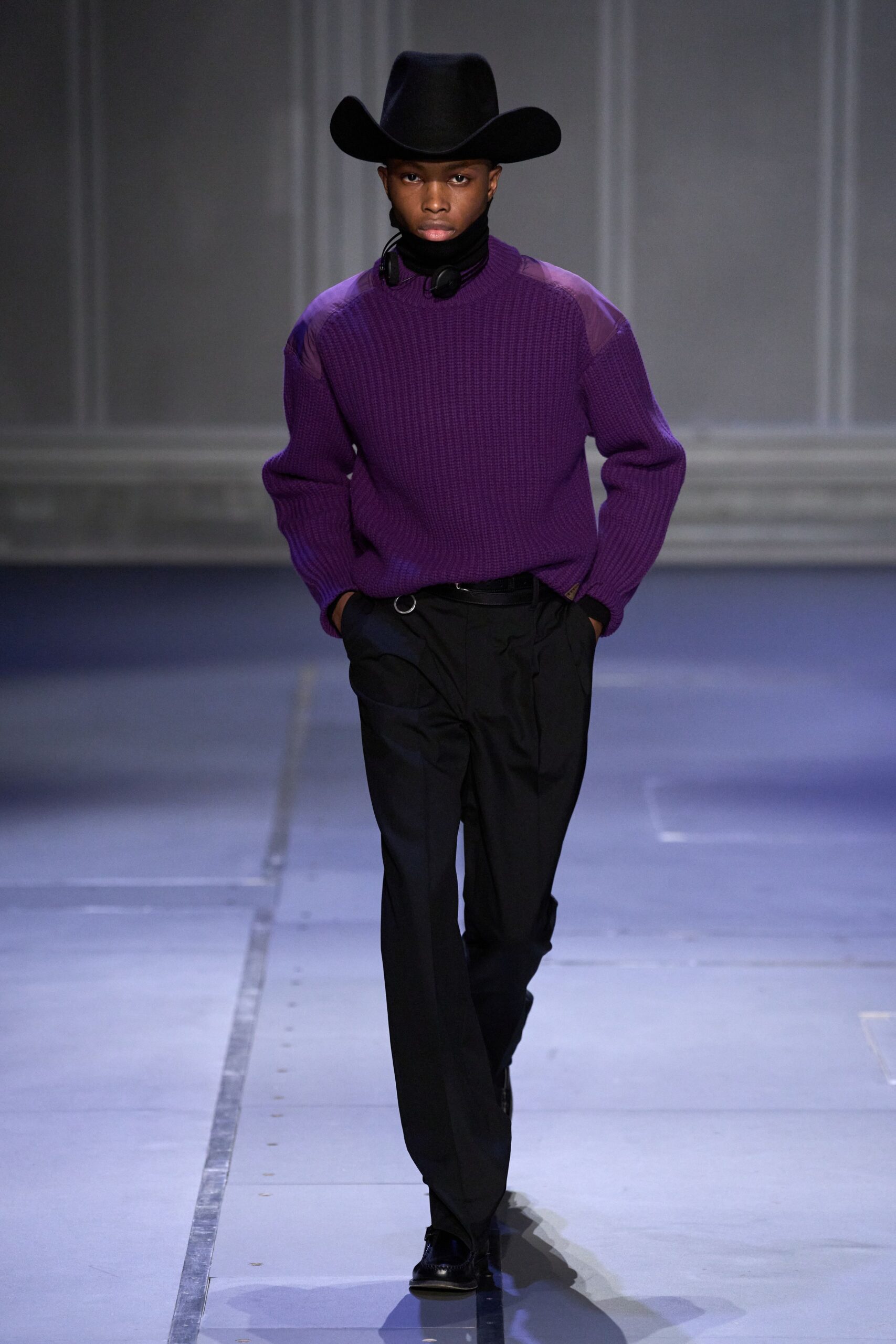 purple wool sweater with black pants