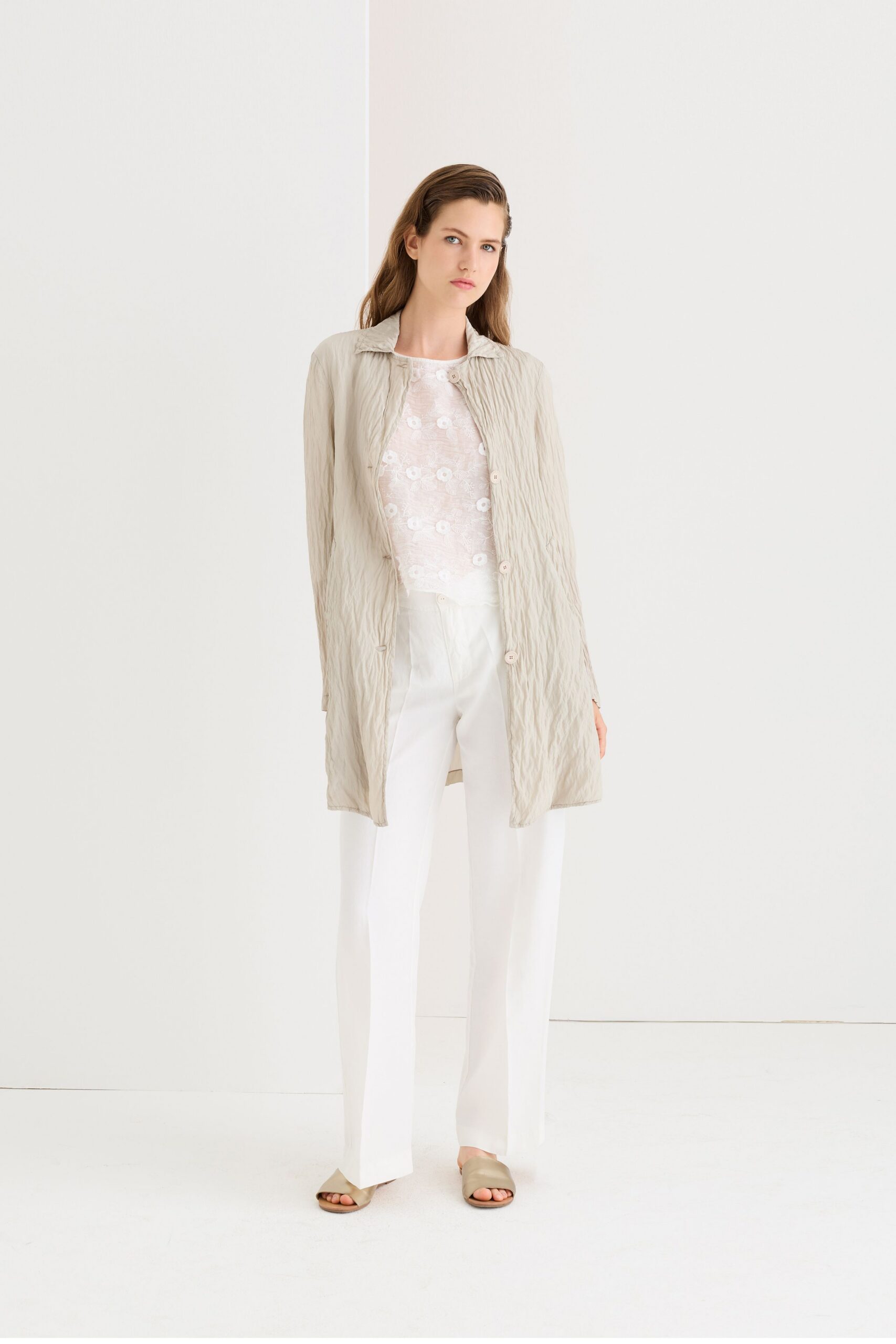beige coat white top tailored pants