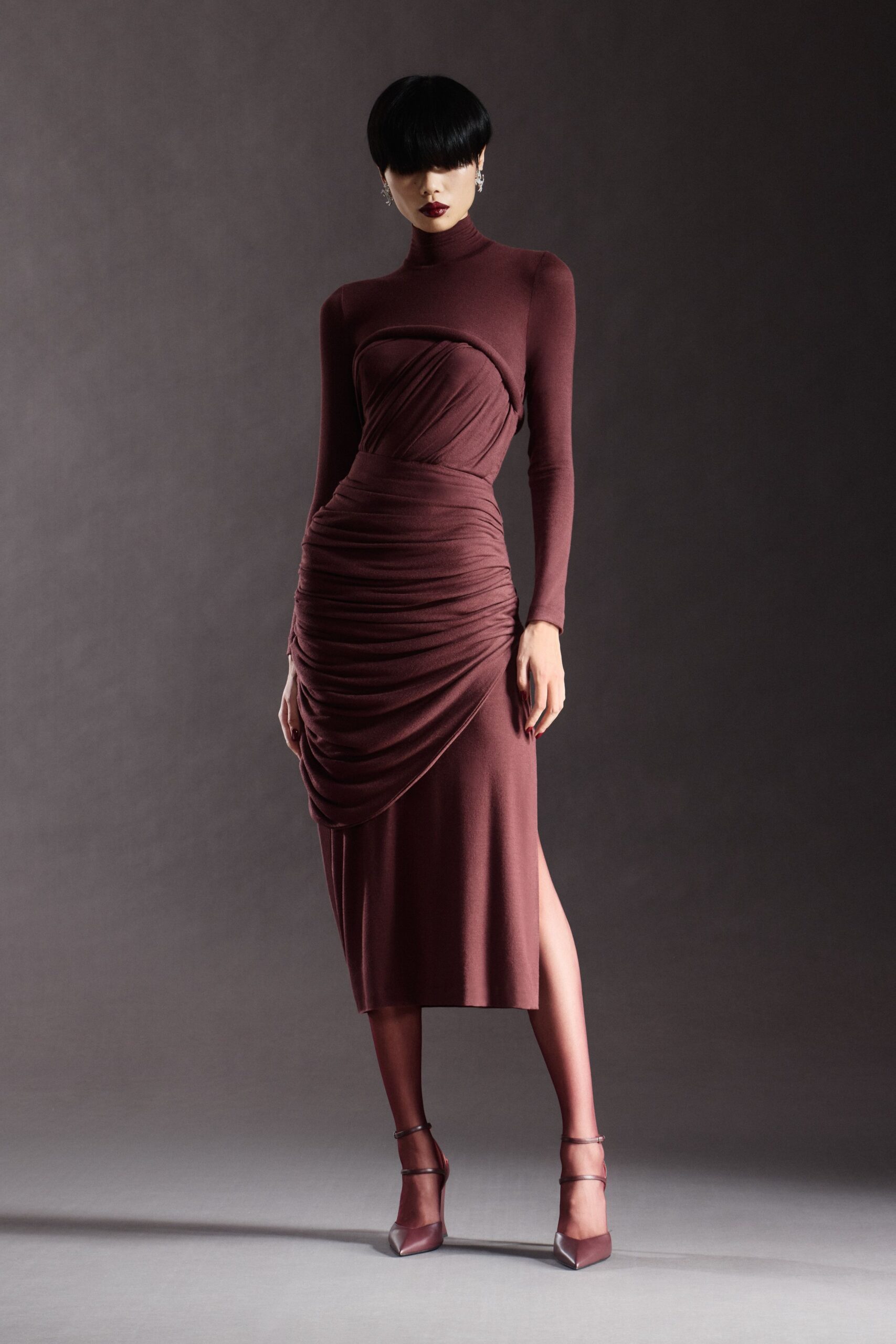 maroon fitted long-sleeve dress with slit
