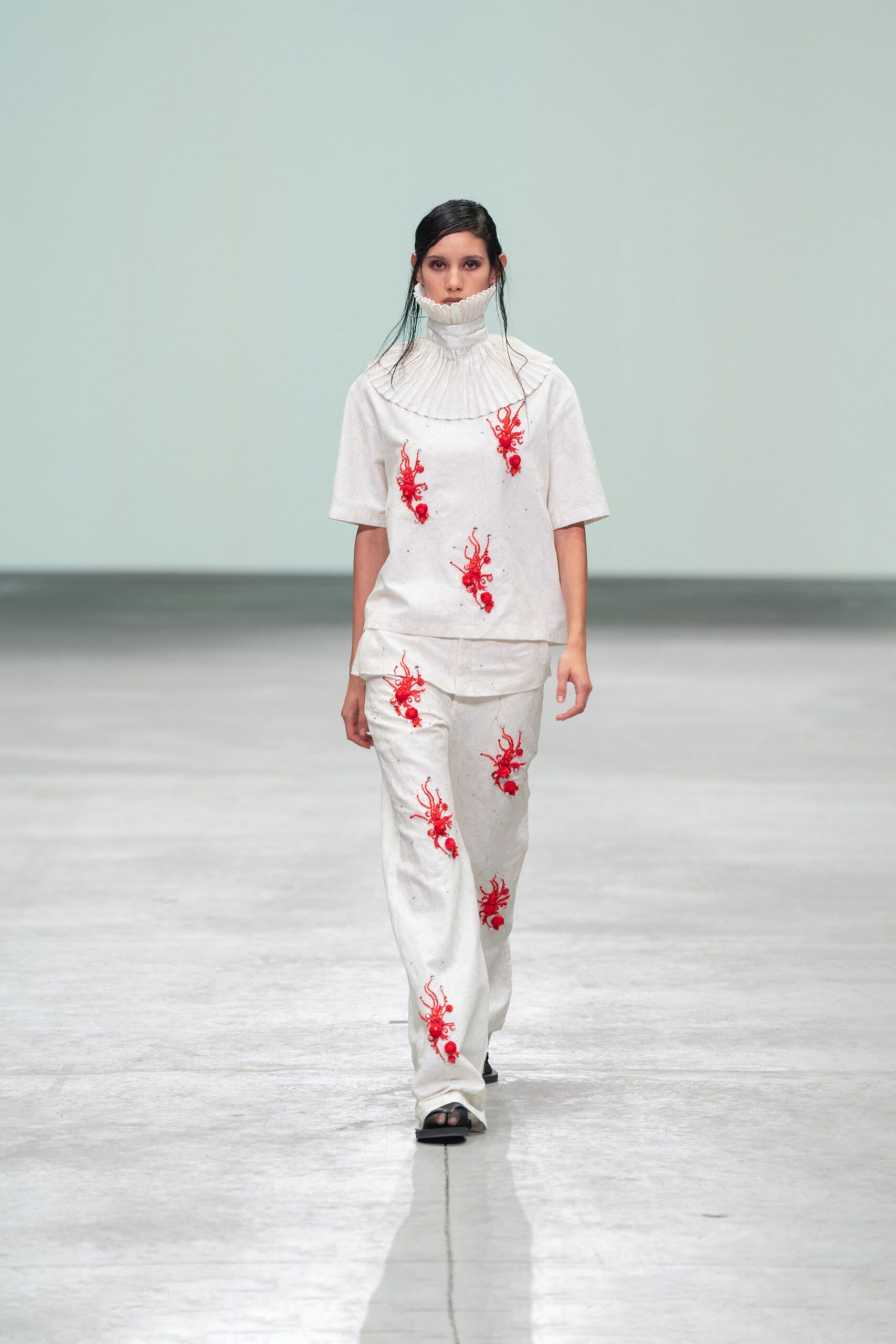 white embroidered top and pants