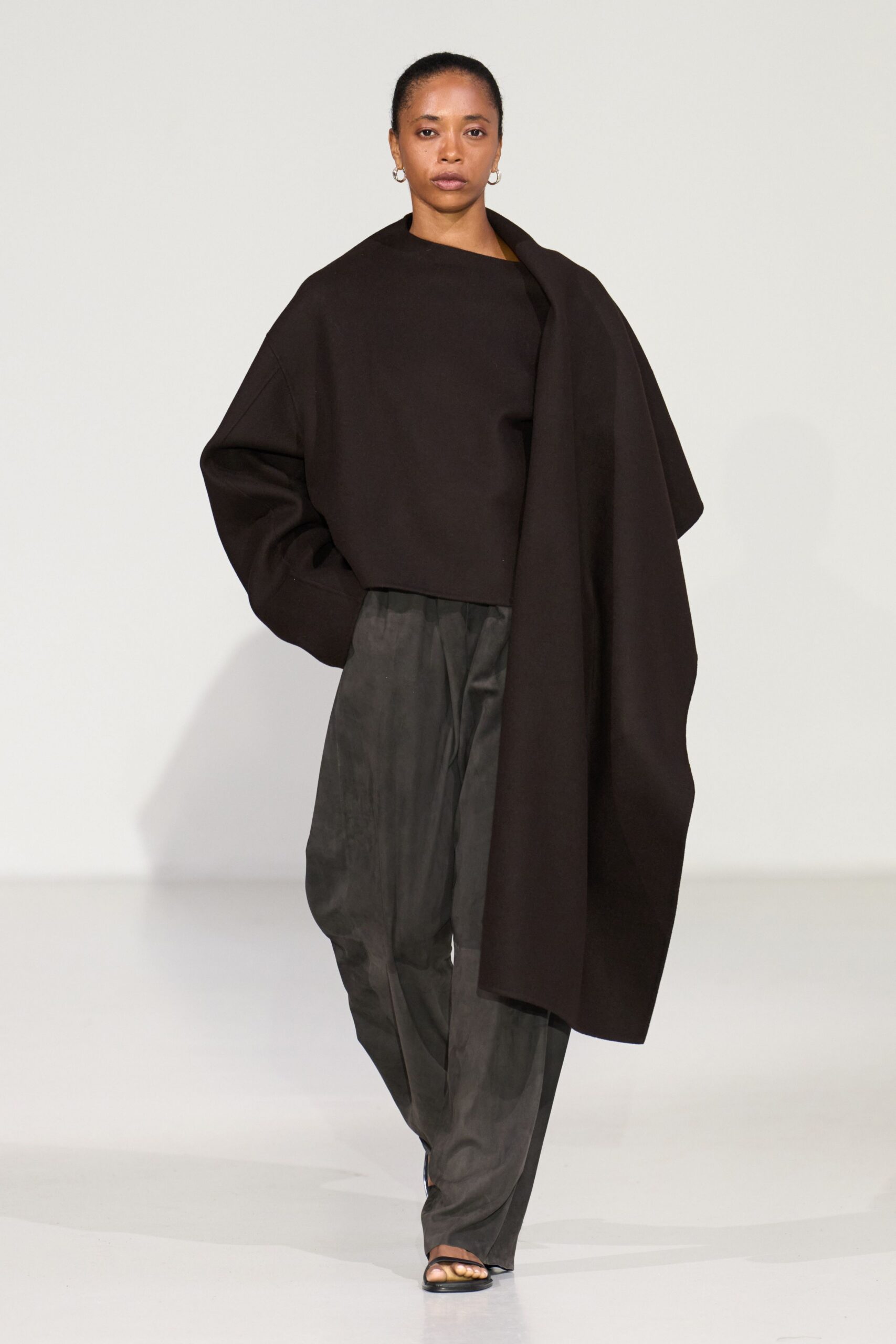 black relaxed top gray pants