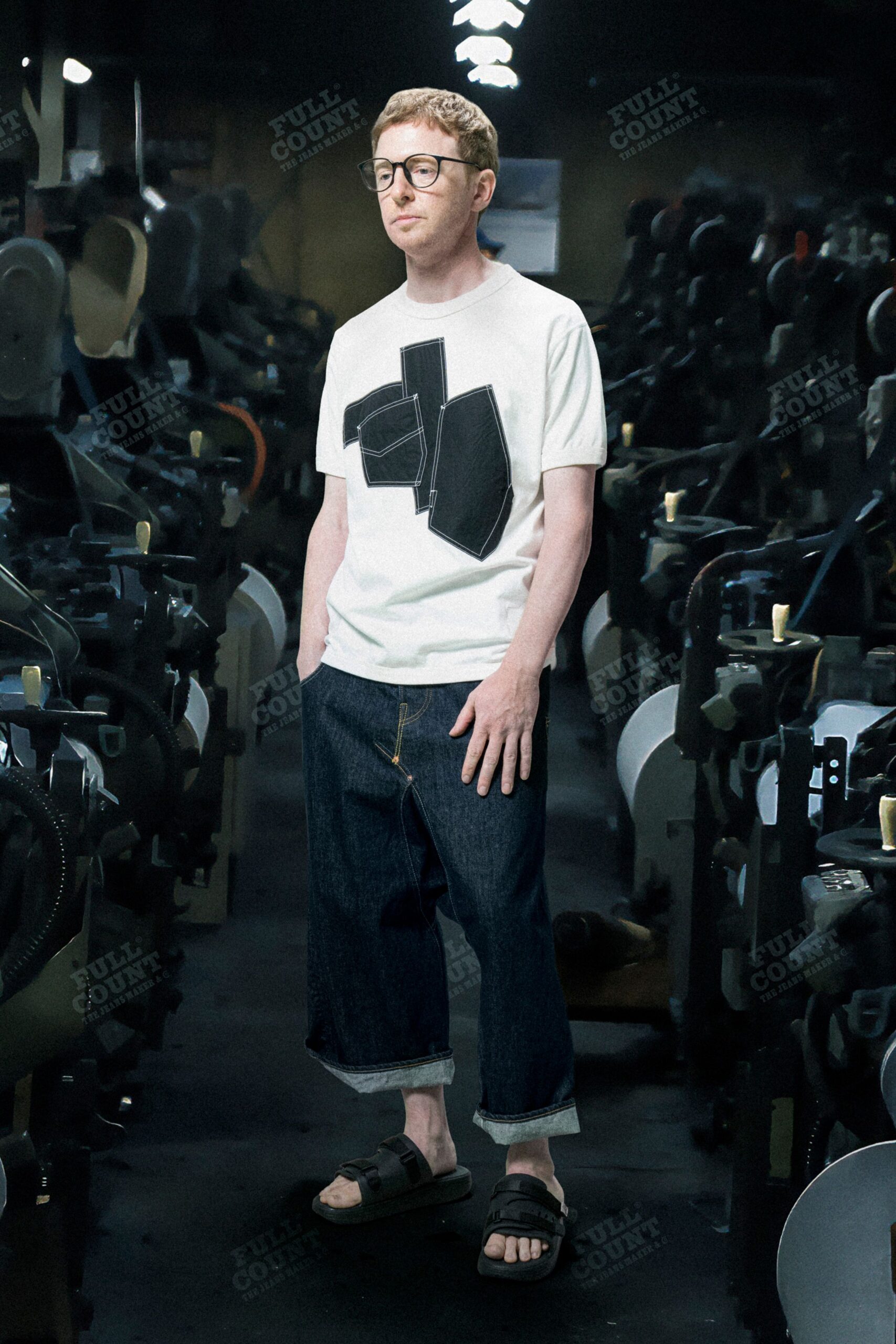 white printed t-shirt with blue denim pants
