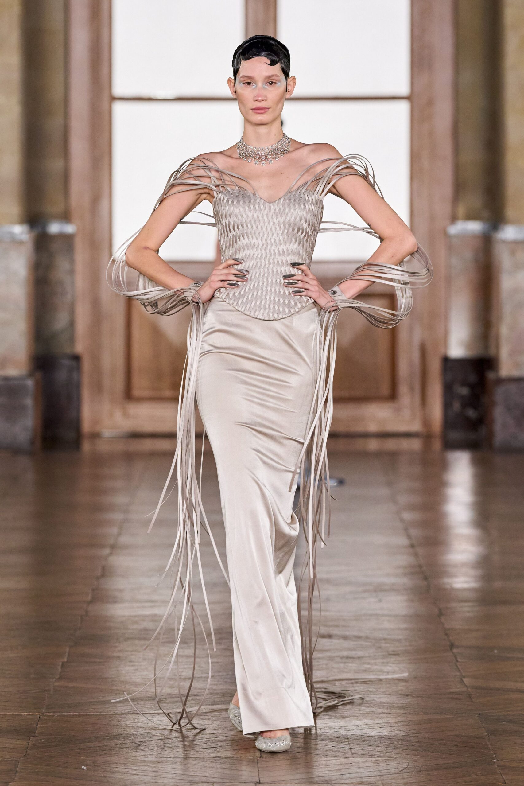 beige silk sleeveless off-shoulder fitted ruched draped gown