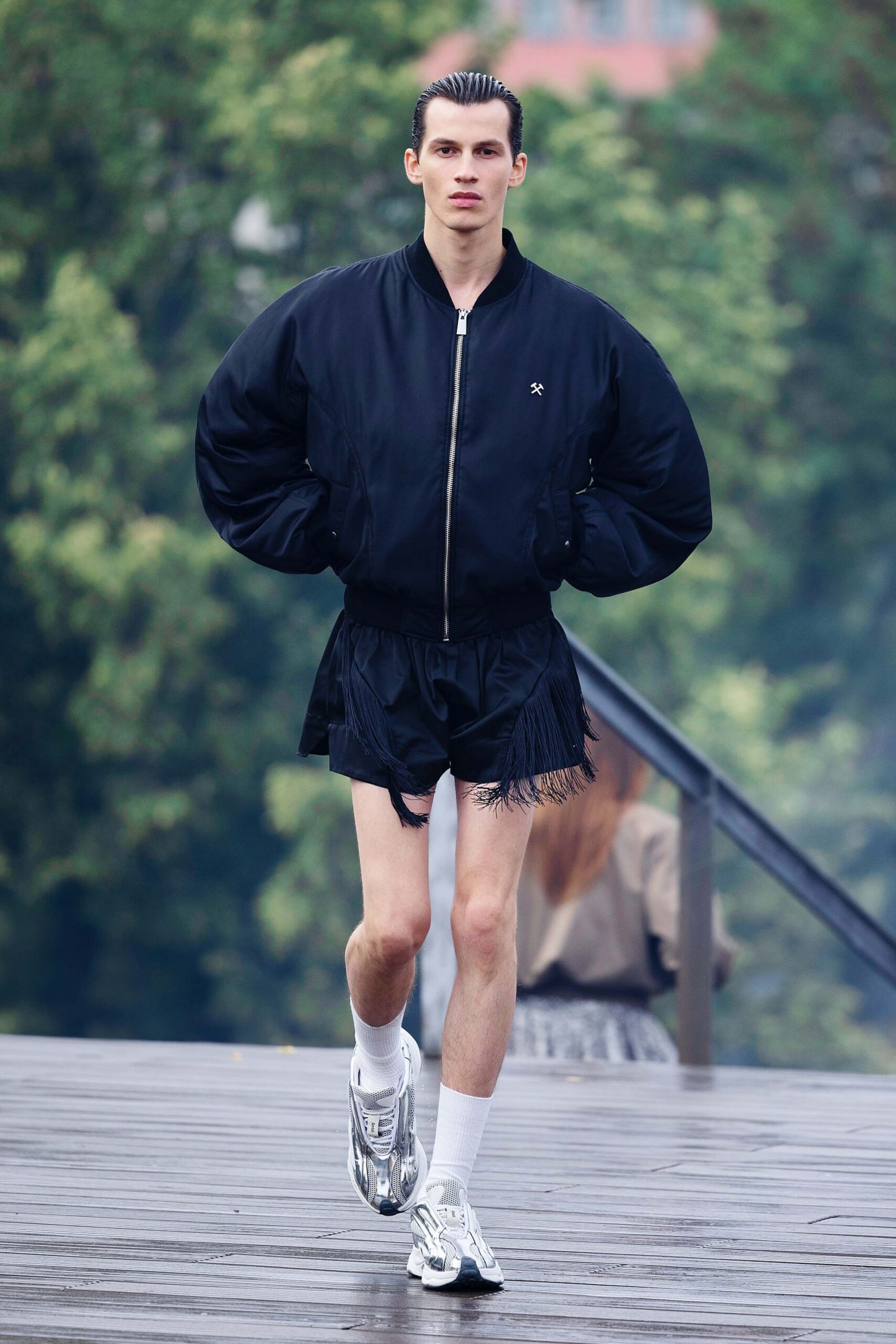 black oversized jacket with fringed shorts