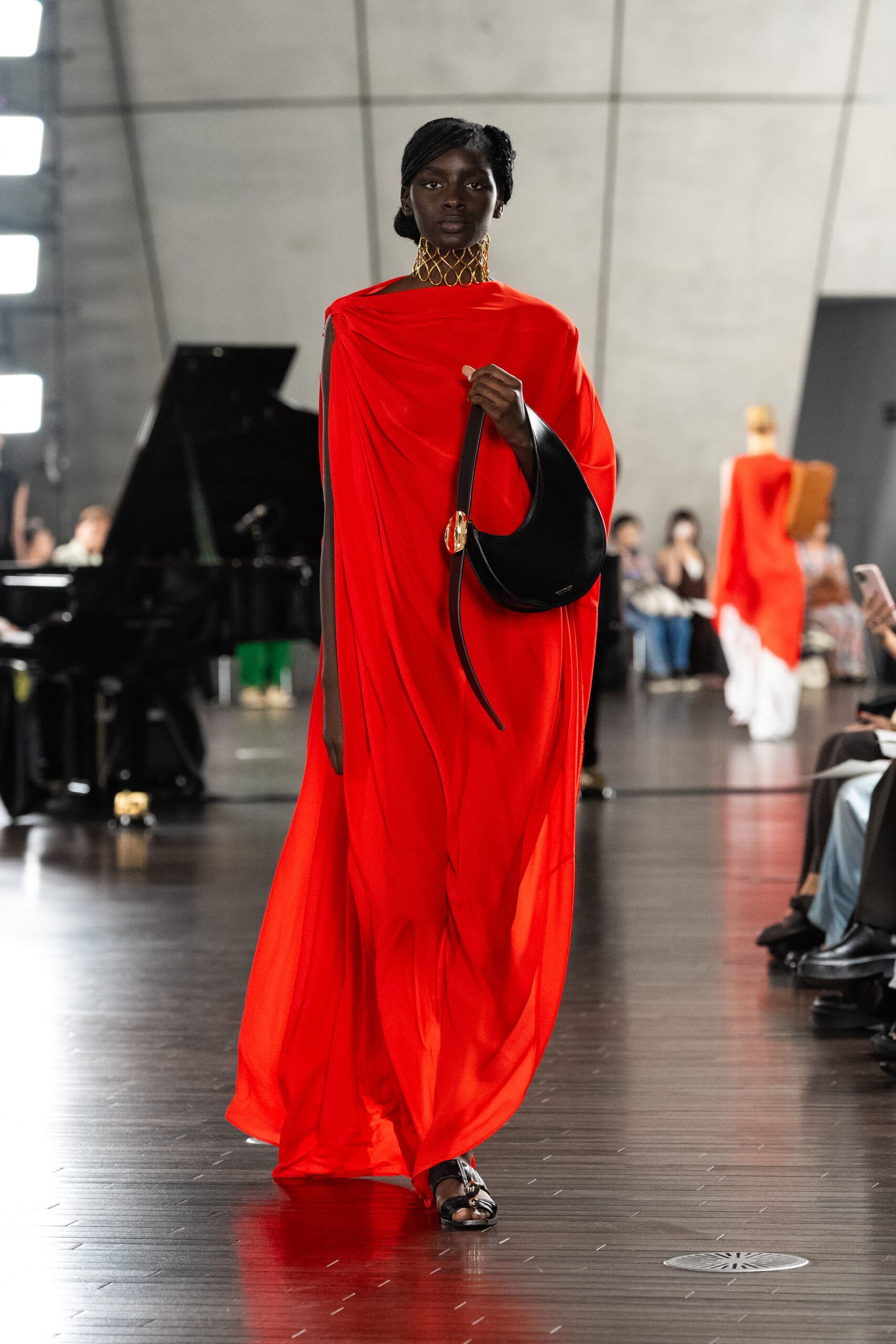 red silk sleeveless high-neck draped flowing maxi gown