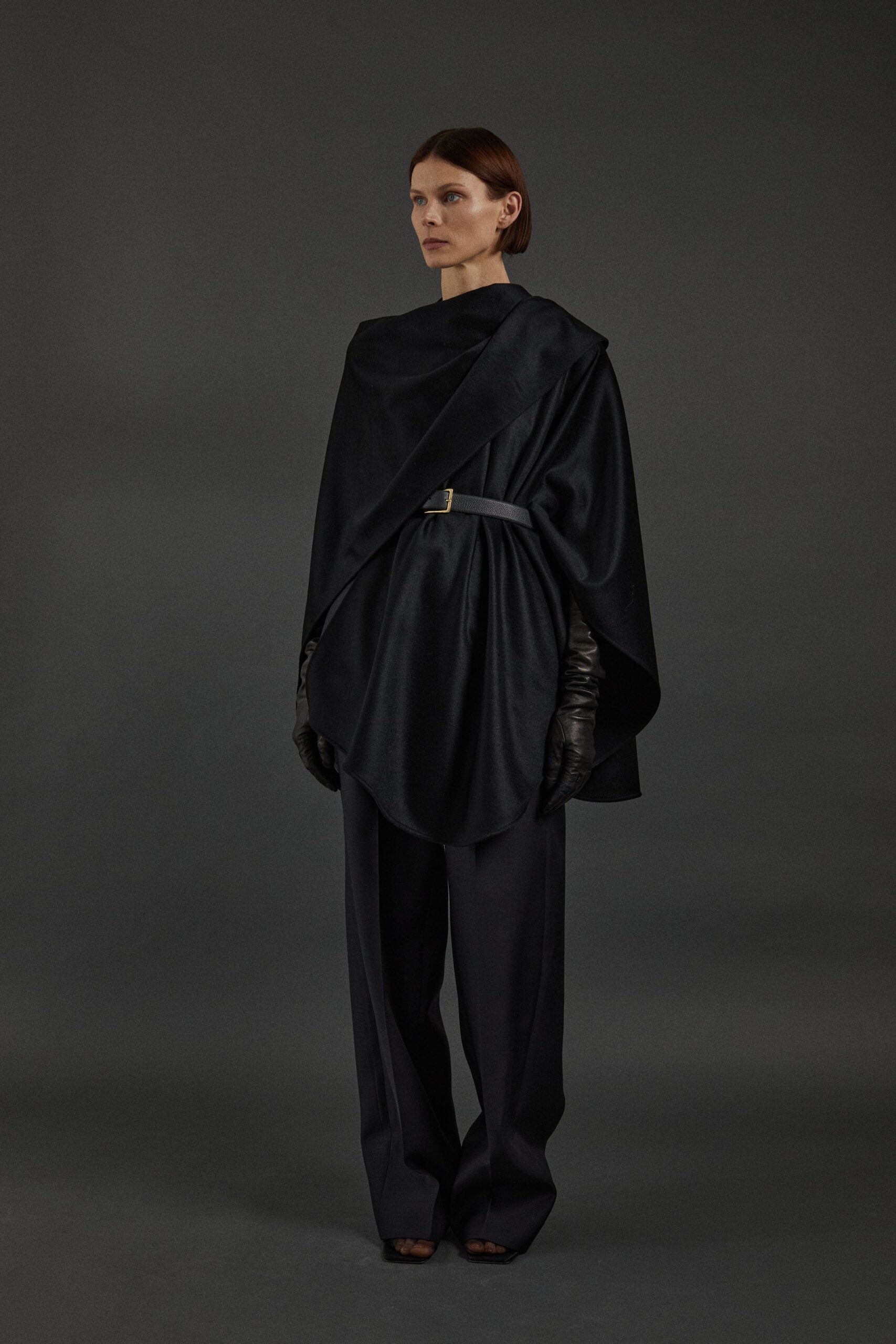 black silk cape and tailored pants