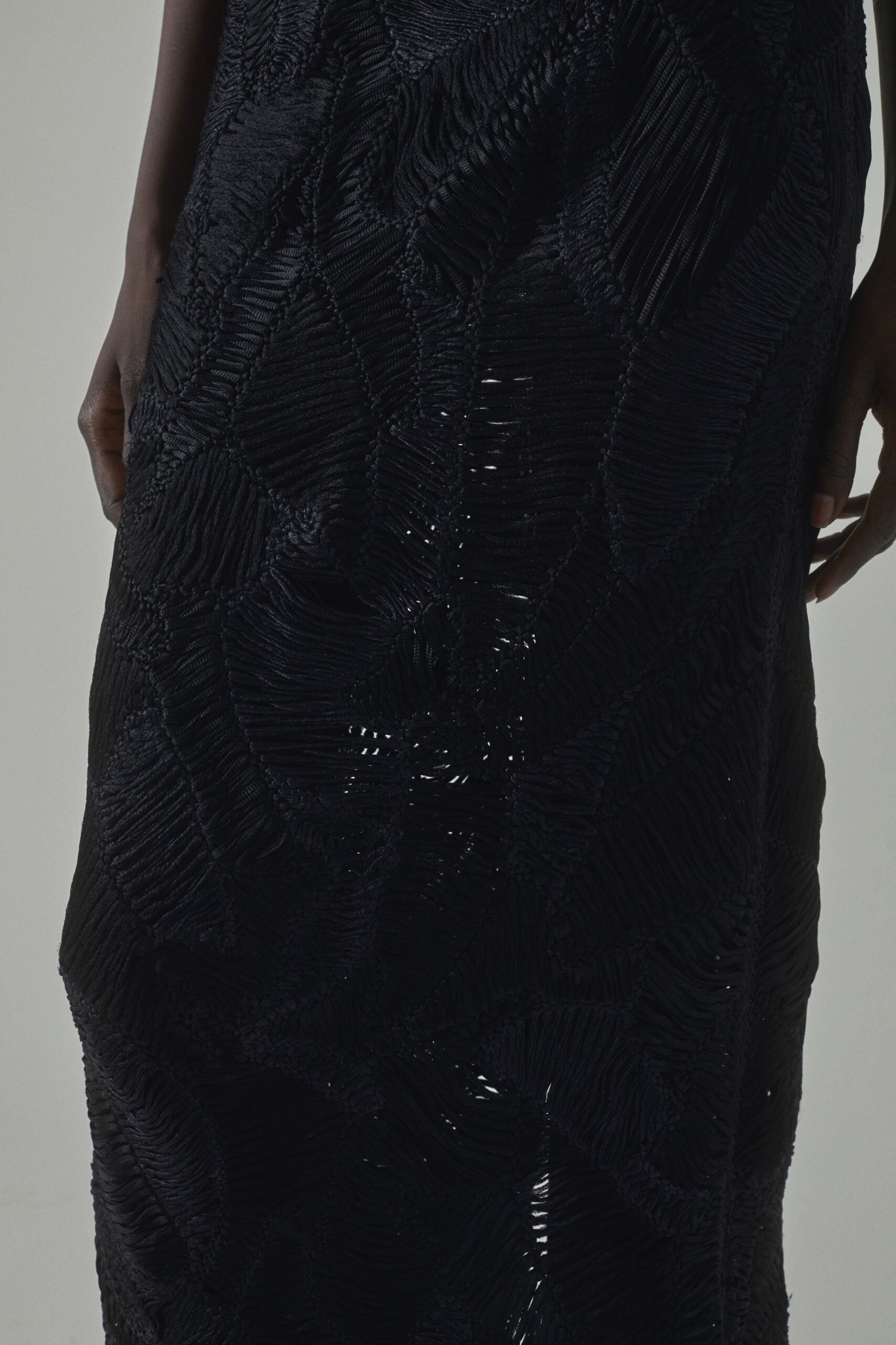 black pleated sleeveless maxi dress