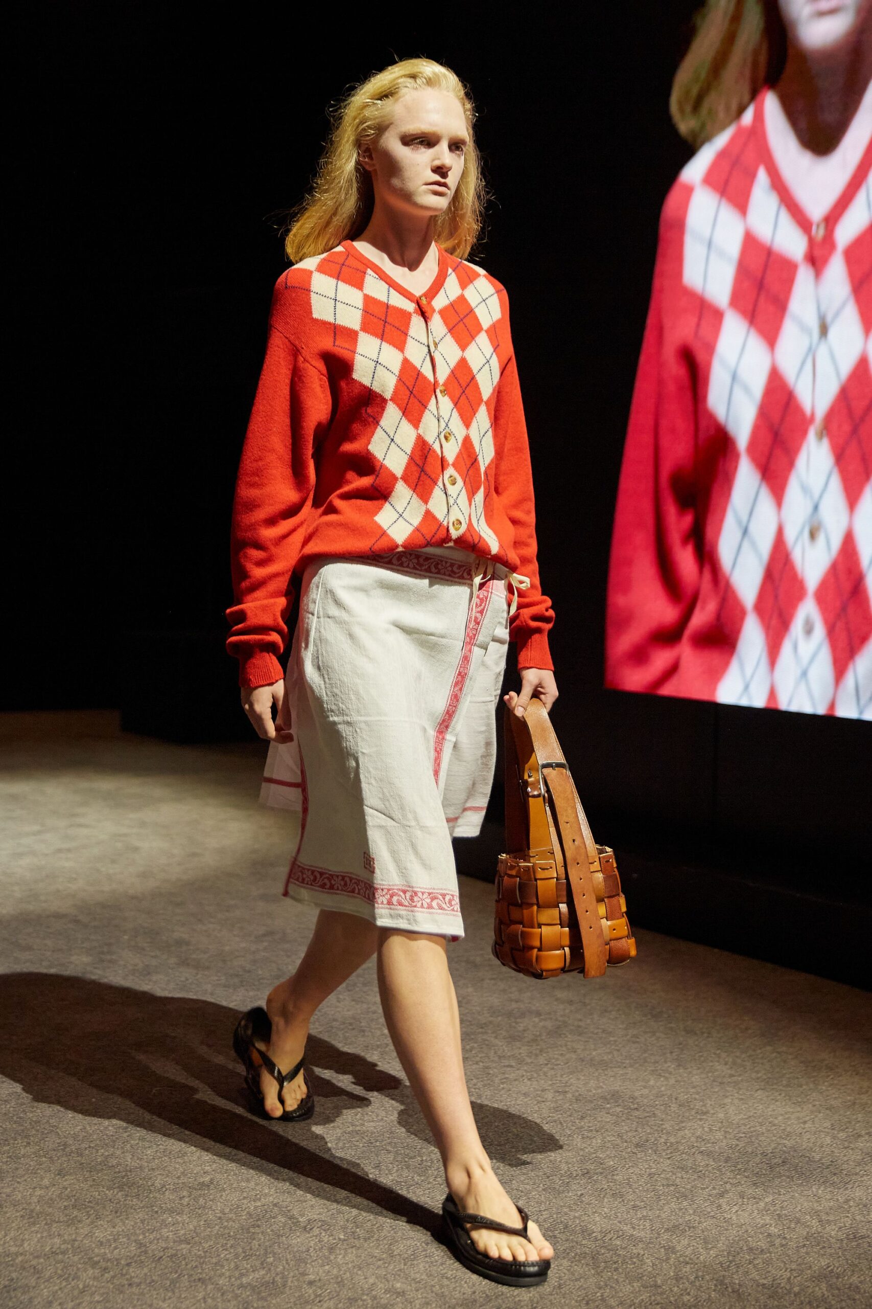 red and white checked sweater with white skirt