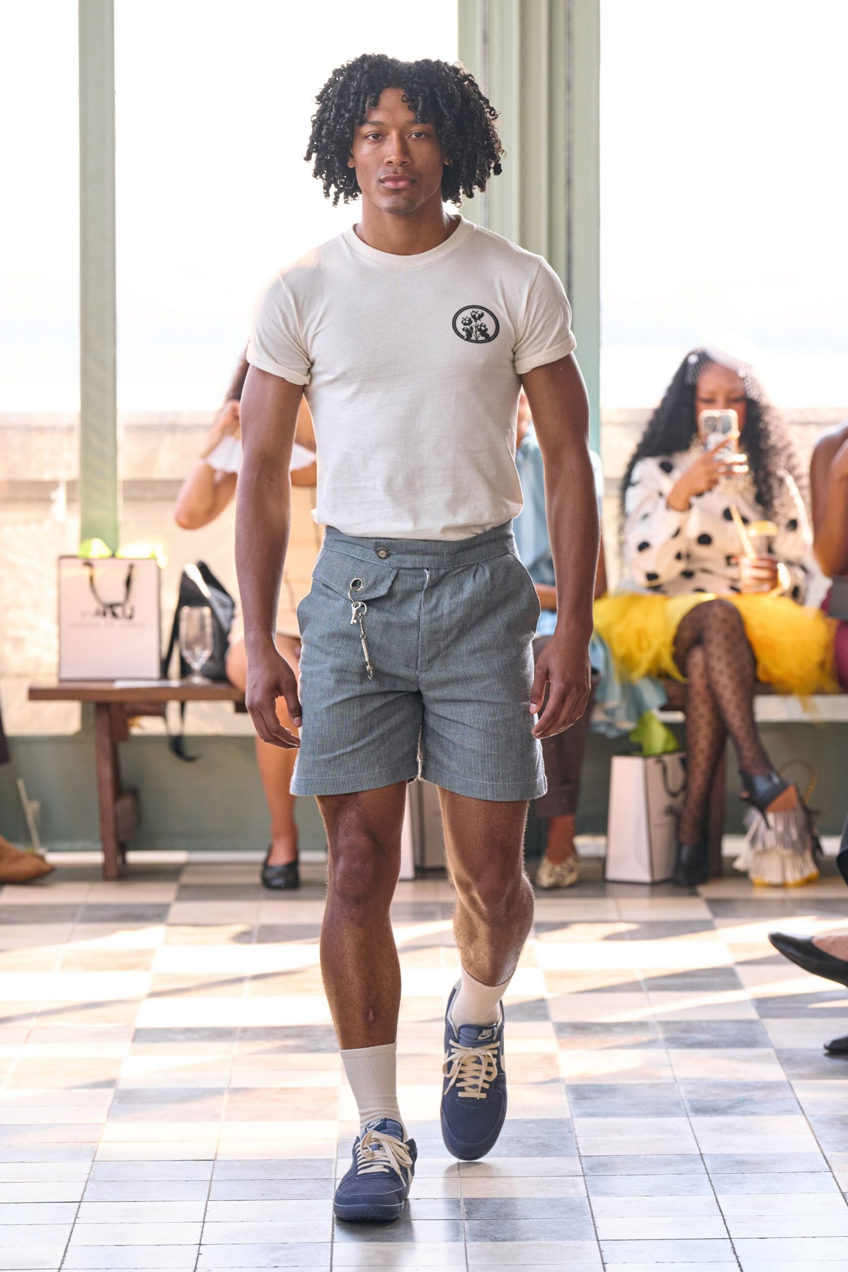 white fitted t-shirt with blue shorts