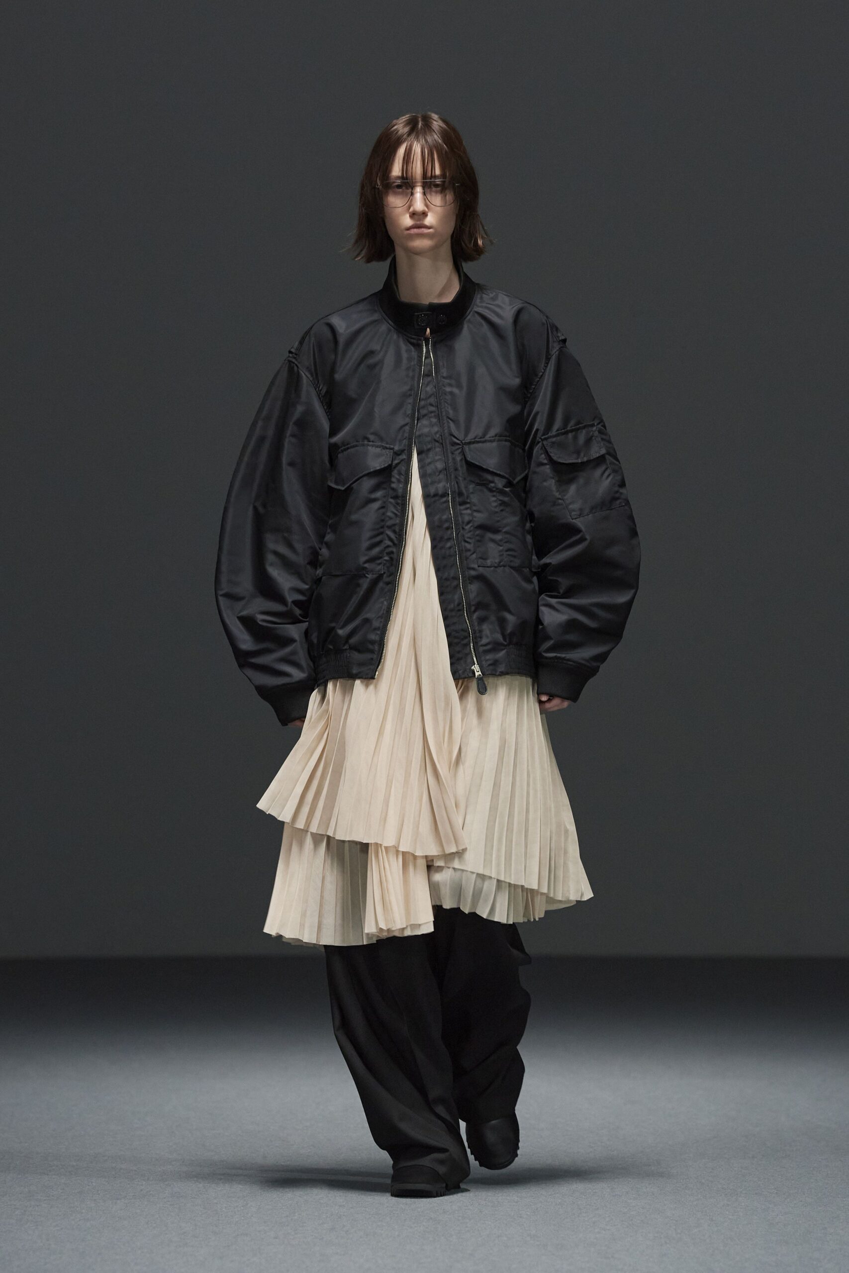 black oversized jacket beige pleated dress