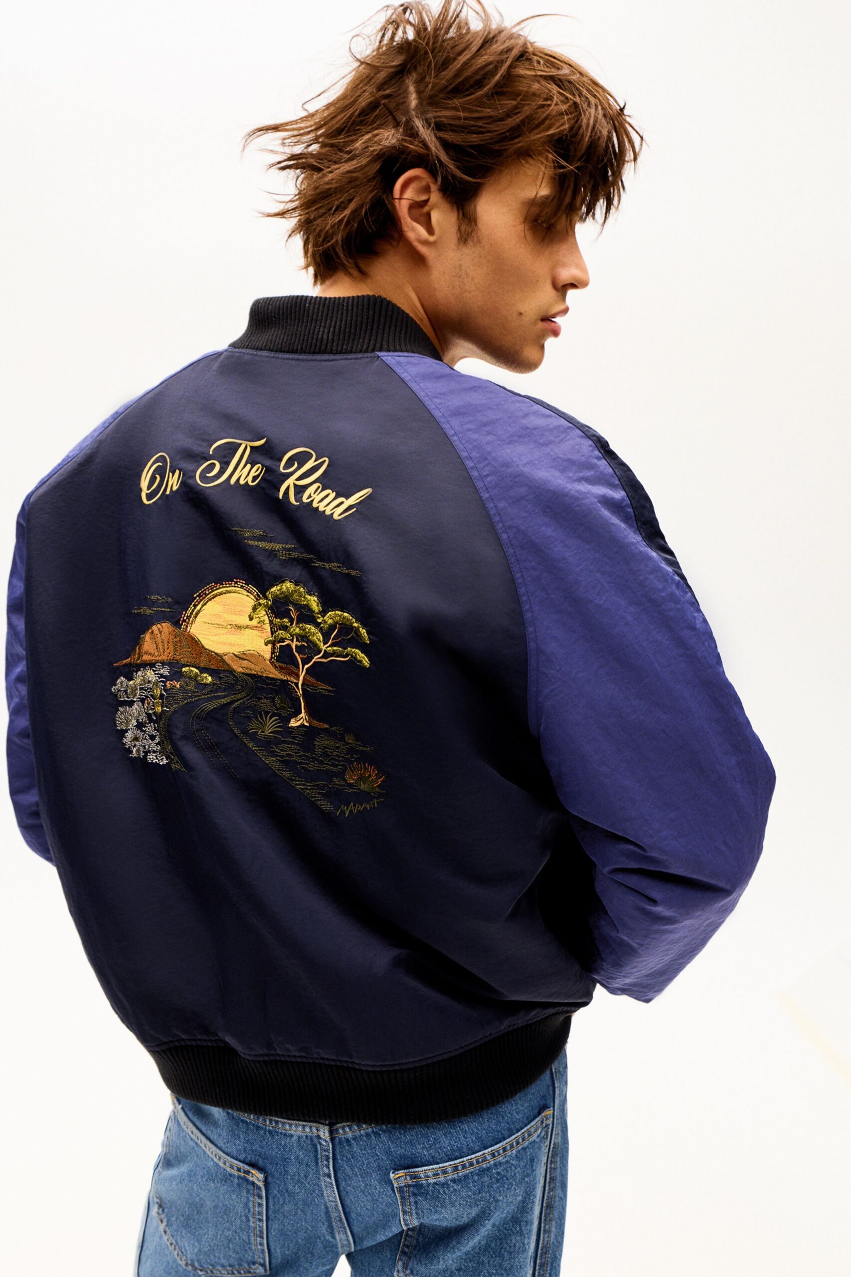 blue embroidered jacket with denim pants