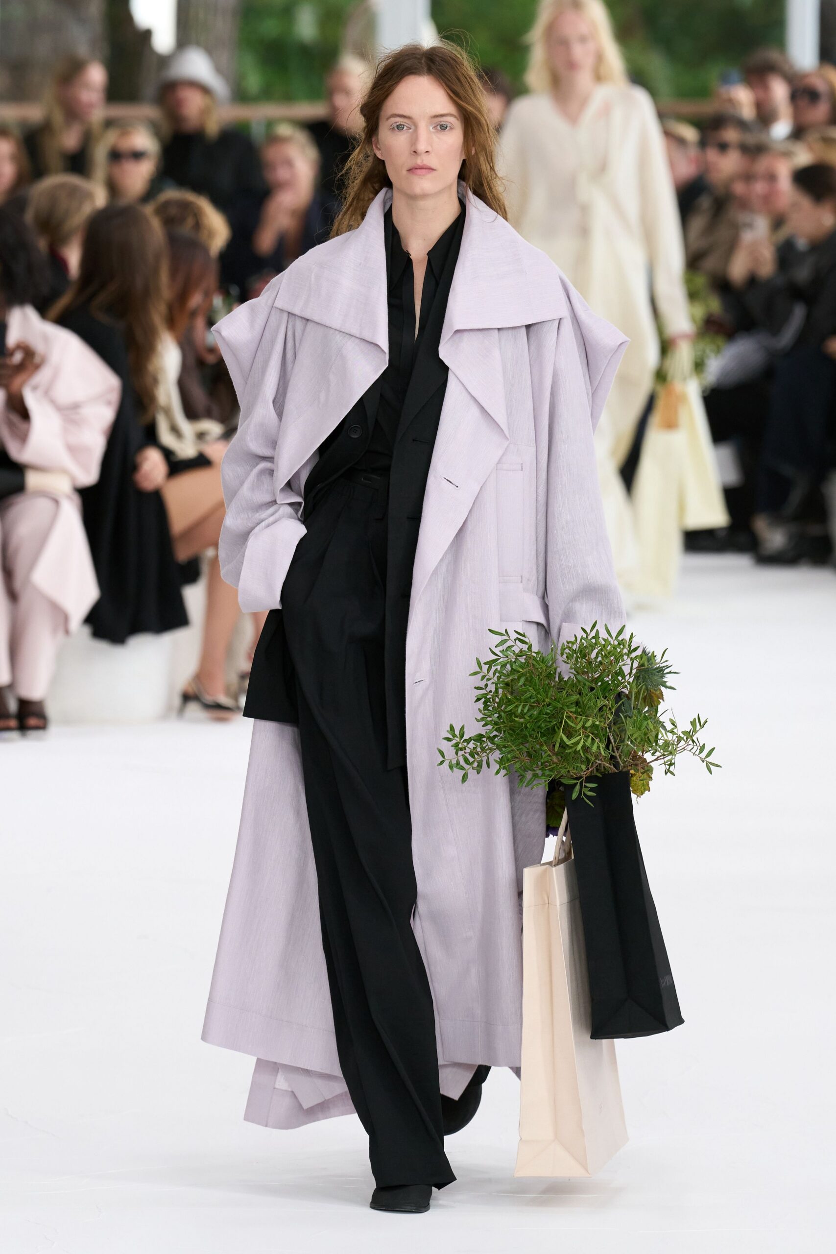 lavender coat with black pants