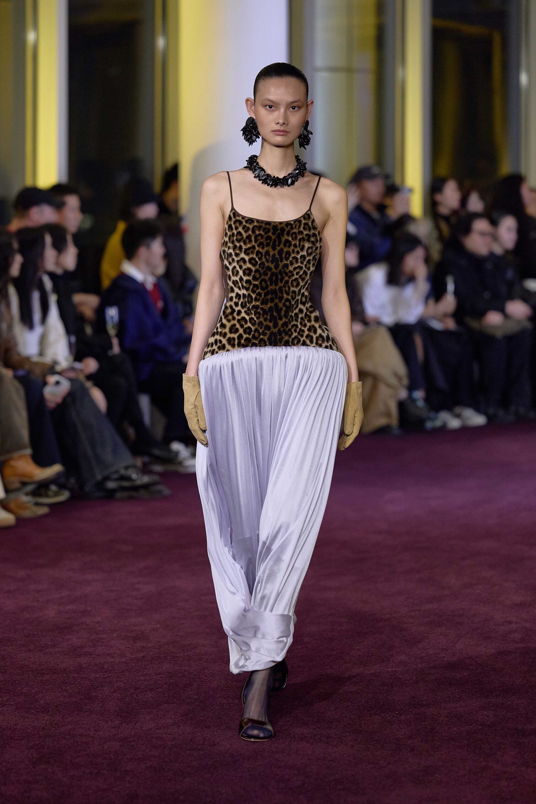 animal-print silk top with pleated pants