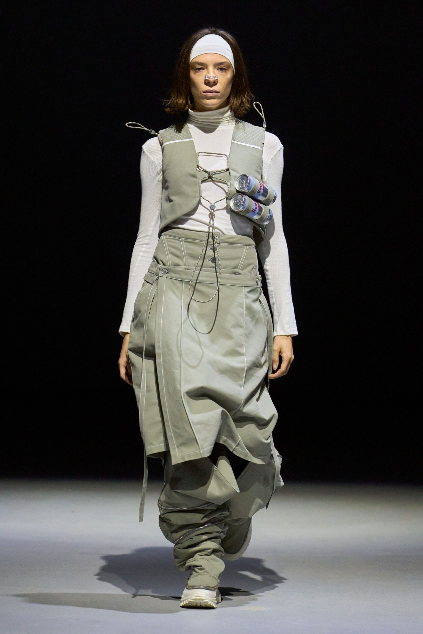 gray relaxed jumpsuit with white shoes