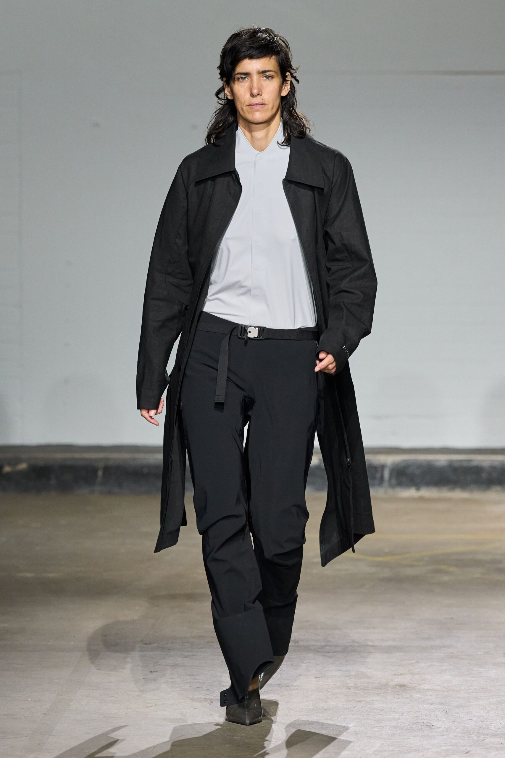 black coat white shirt black pants