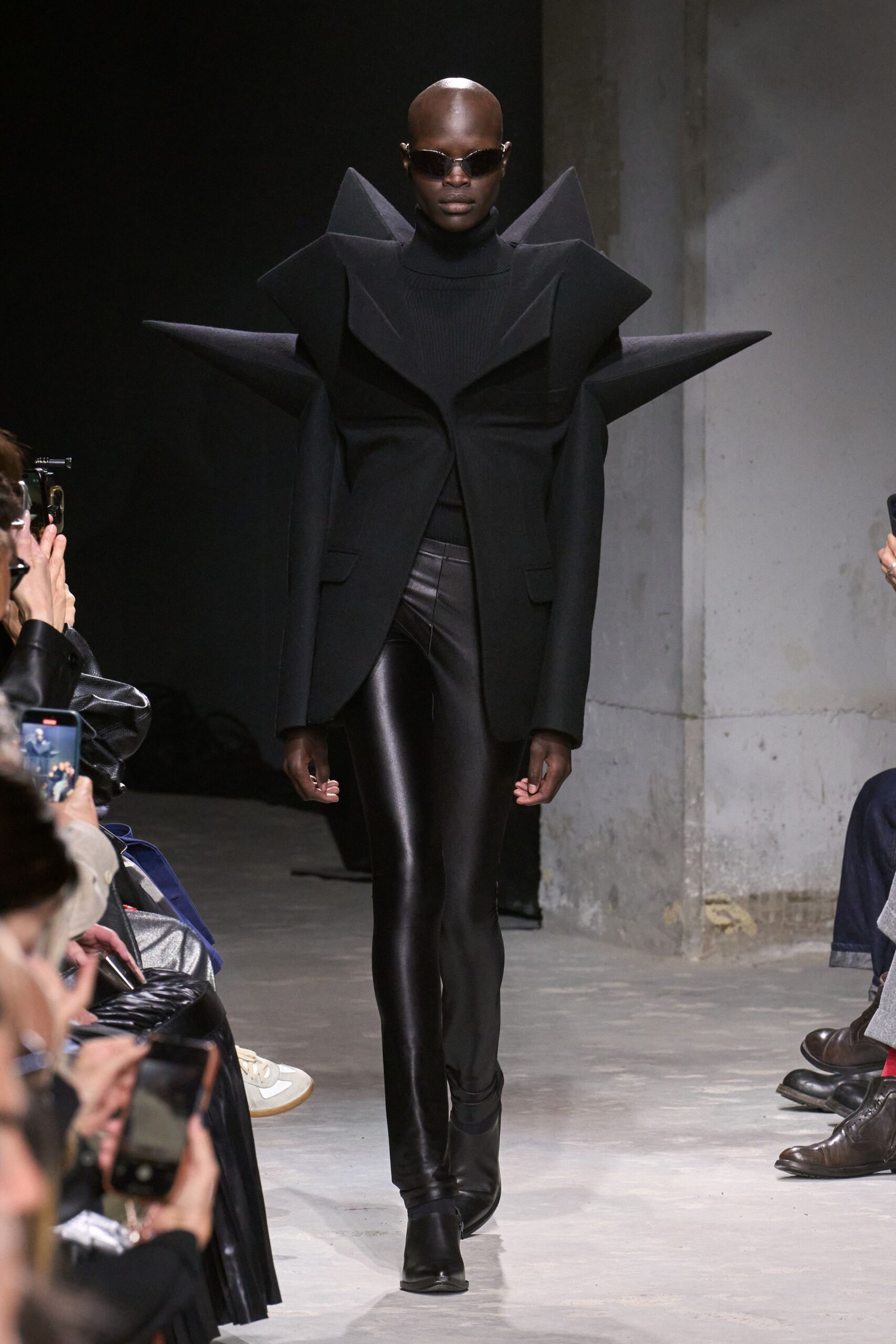 black structured blazer with leather pants