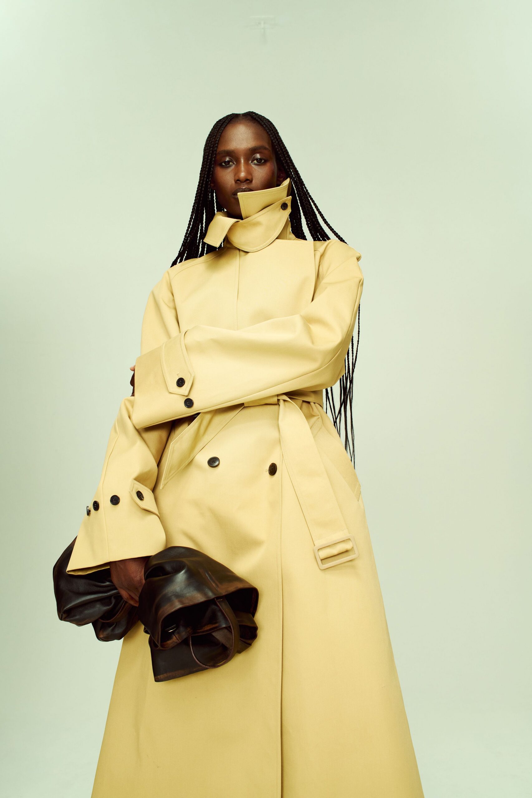 yellow vinyl long-sleeve collared relaxed belted trench