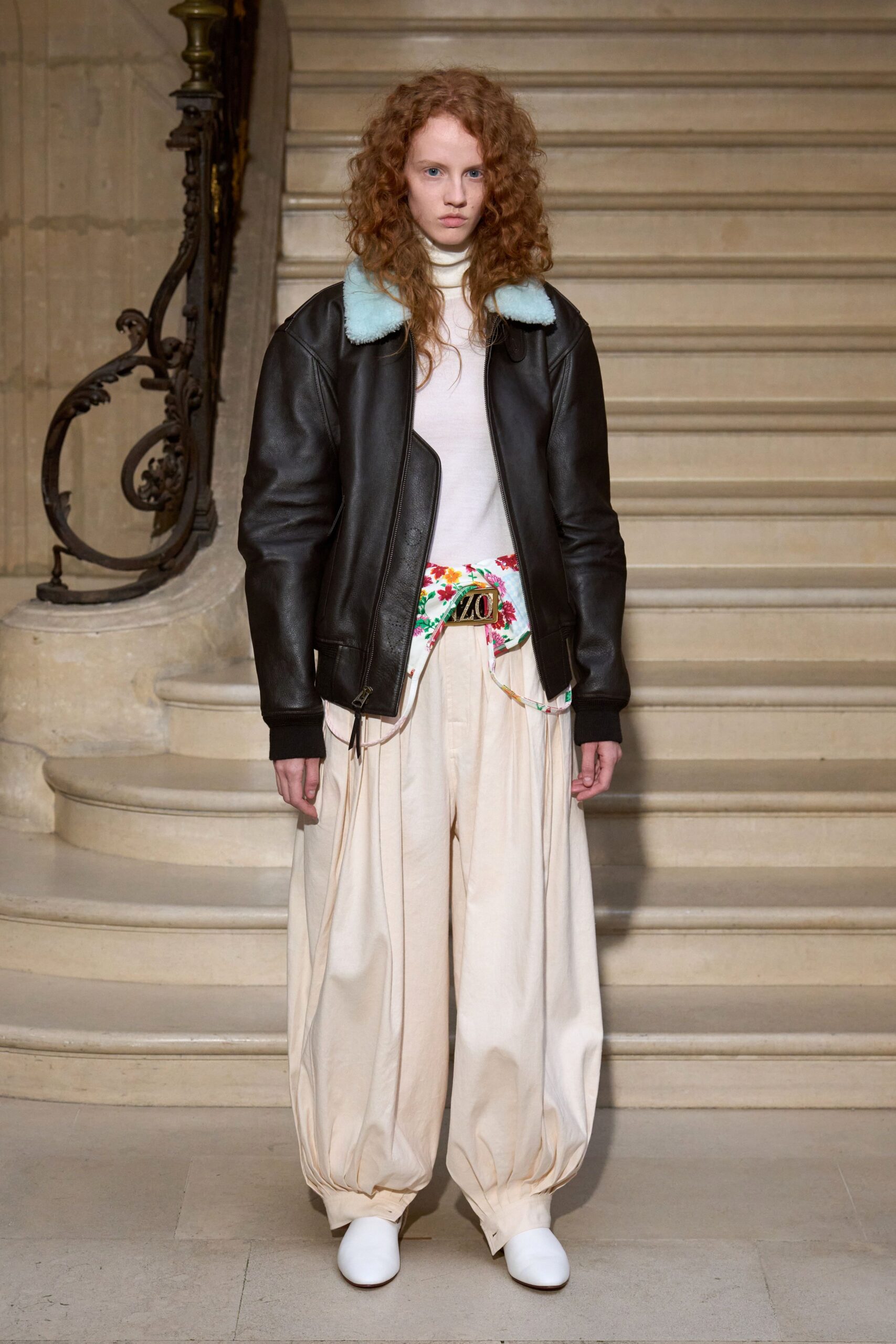 black leather jacket with white top