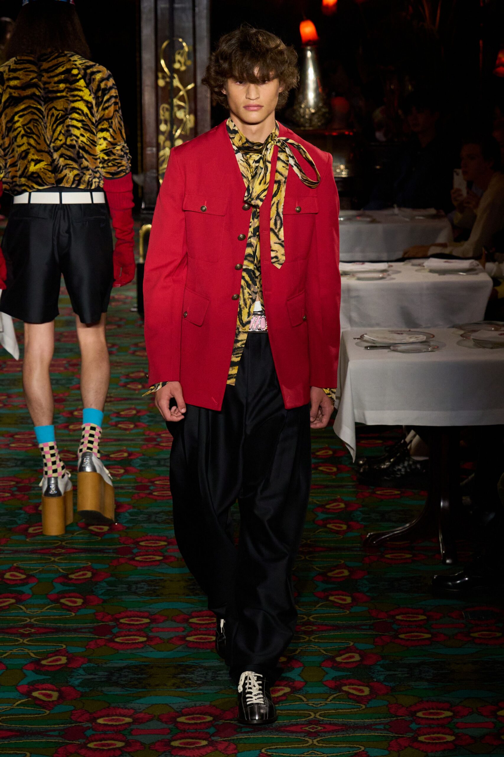 red long-sleeve collared structured buttoned jacket