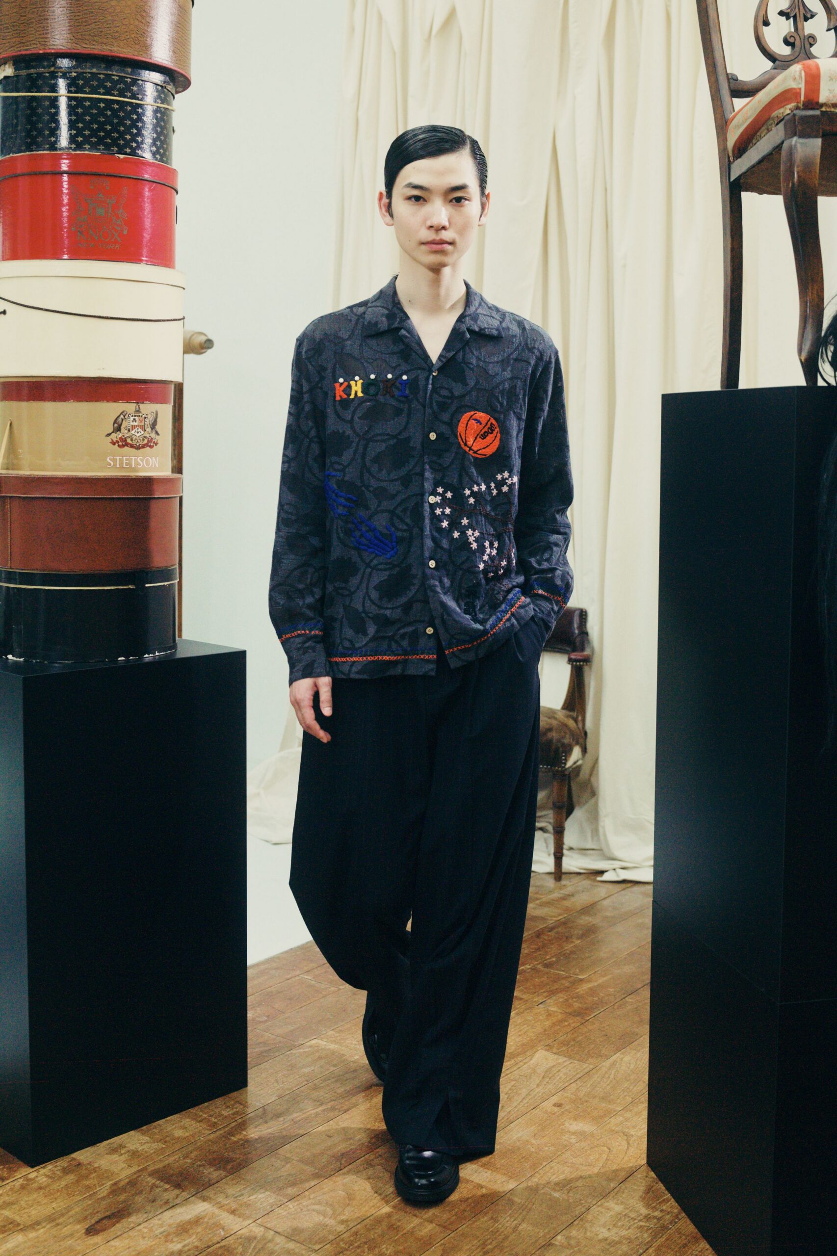 black printed shirt with wide-leg pants