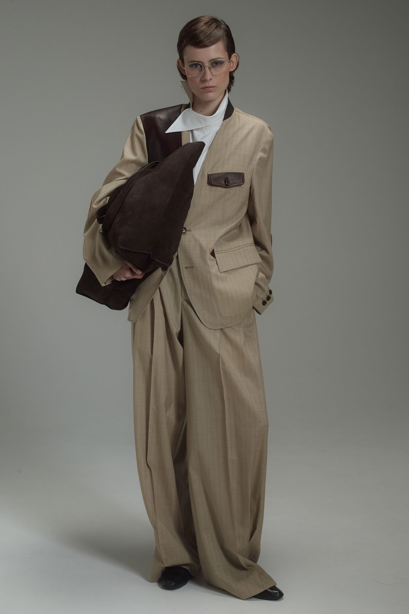 beige structured blazer with relaxed pants