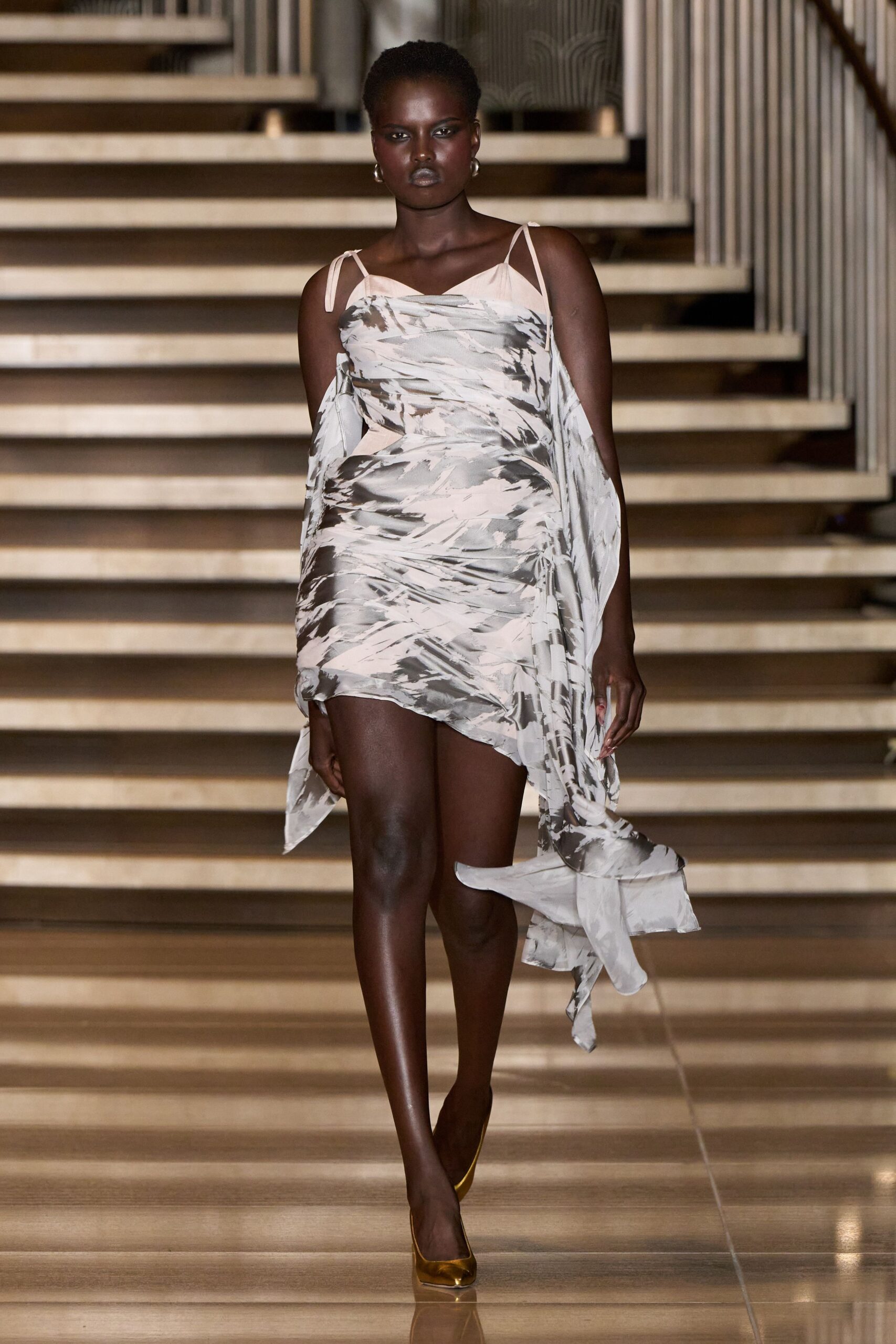 white silk sleeveless asymmetric fitted draped flowing dress
